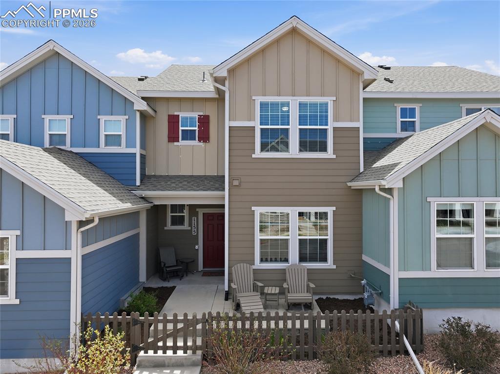 Welcome to effortless Westside living in the highly sought-after Gold Hill Mesa community. Perfectly positioned at 1155 Solitaire Street, this immaculate, better-than-new townhouse offers the ideal blend of style, convenience, and lifestyle.Pull directly into your attached 2-car garage—complete with electric vehicle charging—and step into a pristine interior featuring gleaming hardwood floors and an inviting, open-concept main level. The thoughtfully designed layout includes a convenient half bath, spacious living and dining areas, and a beautiful kitchen with a center island perfect for gathering and entertaining. Just outside, enjoy your own fenced front patio—an ideal spot to relax, take in the peaceful surroundings, and soak up the neighborhood charm.Upstairs, the private primary suite offers a walk-in closet and a serene retreat at the end of the day. Two additional bedrooms, a full hall bath, and an upstairs laundry room provide comfort and functionality for everyday living.Beyond the home, Gold Hill Mesa is all about lifestyle. Enjoy summer concerts, community events, parks, and miles of nearby hiking and biking trails. With a true sense of community, low-maintenance living, and amenities including a neighborhood gym, you’ll find everything you need right at your doorstep.Located just minutes from Bear Creek Park, Garden of the Gods, and downtown Colorado Springs, this prime Westside location offers quick access to outdoor adventure, dining, and entertainment.This is more than a home—it’s a lifestyle.