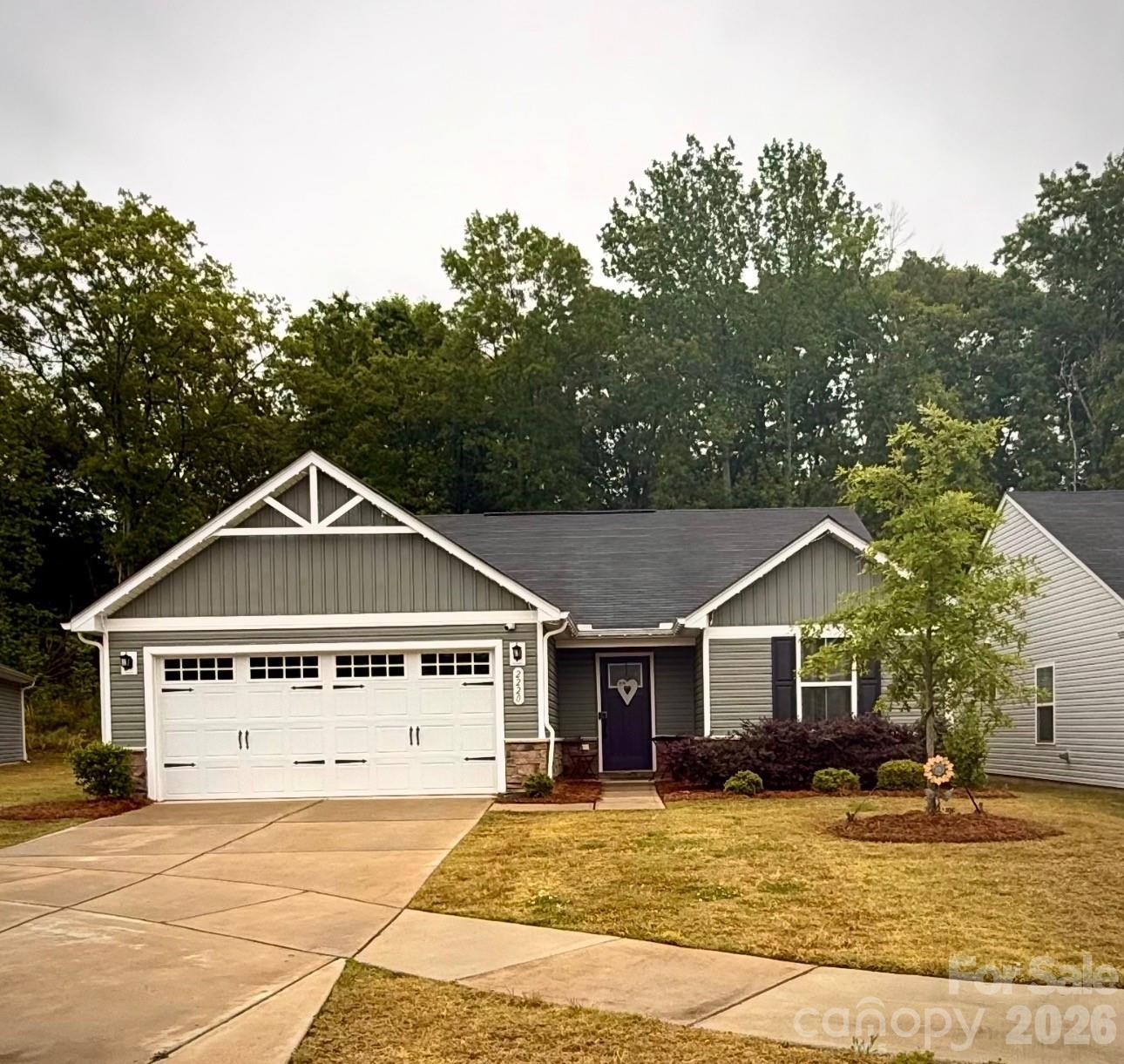 Step into effortless living in this stunning 2022 ranch home, where style, comfort, and convenience come together. Sunlight fills the open floor plan, highlighting the home’s fresh neutral palette, upgraded kitchen cabinetry, and sleek stainless steel appliances.Enjoy meals in the light-filled dining area overlooking your backyard fully fenced, and peaceful green space behind the property. It’s the perfect setting for gatherings, grilling, or quiet evenings outdoors.Your owner’s suite offers a generous walk-in closet and easy access to the laundry room. Storage is abundant, especially in the oversized 2-car garage with extra room for hobbies or equipment.With HOA lawn maintenance, you’ll have more time to enjoy everything this location offers—just minutes from shopping, dining, and Reedy Creek Park.This home has been lovingly maintained and is truly move-in ready.