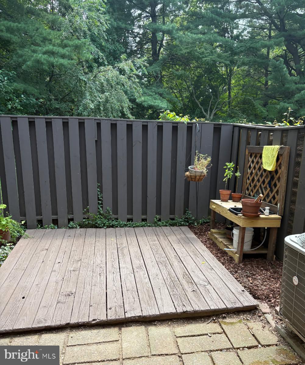 This beautifully well maintained townhome in Reston is ready for its next owner.  1386 Northgate Square offers everything that buyers will want.  Three bedrooms, 1.5 bathrooms with over 1200 square feet, on two levels.  Secluded under large mature trees,  this townhouse is both private and quiet.  Mid-century modern architecture, you'll find beautiful porque floors on the first level. Updated kitchen with large living room to sit back and relax.  Two large sliding glass doors allows natural light to enhance every room of this home.  Both front and backyards offer a patio's, to enjoy the tranquility of living in Reston.  Upstairs hardwood floors continue, with 3 bedrooms and one full bath.  Large closets are perfect for storing household items not in use.   New kitchen cabinets 2021, remodeled bathroom and kitchen backsplash 2023, gutters and soffits 2024, paint 2026. HVAC 2015 and roof 2013.Location is superb, short walk to Lake Anne shopping center, where restaurants, shops and the farmers market will greet you .  Baron Cameron Park is also walking distance, there you can find a dog park, athletic fields, trails, a pond and tennis courts.  Commuters will enjoy the close proximity of Wiehle-Reston Metro station and the Fairfax Connector Bus Station. Reston Town Center is minutes away.You wont want to miss this rare opportunity in the Northgate Community!