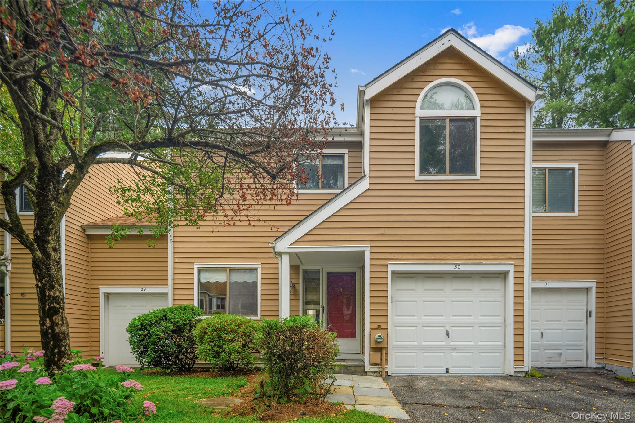Beautifully updated 2-bedroom, 2.5-bath townhouse in the desirable Old Farm Lake community. The open layout features new hardwood floors on the main level, freshly painted interiors, and renovated baths. Upstairs offers two generous bedrooms with ensuite baths, including a primary suite with ample closet space and an updated bath. Relax on your private patio with lake views and enjoy community amenities—pool, tennis, basketball, clubhouse, and fitness center. With low taxes and a prime Chappaqua location near schools, shops, and train, this home is a must-see!