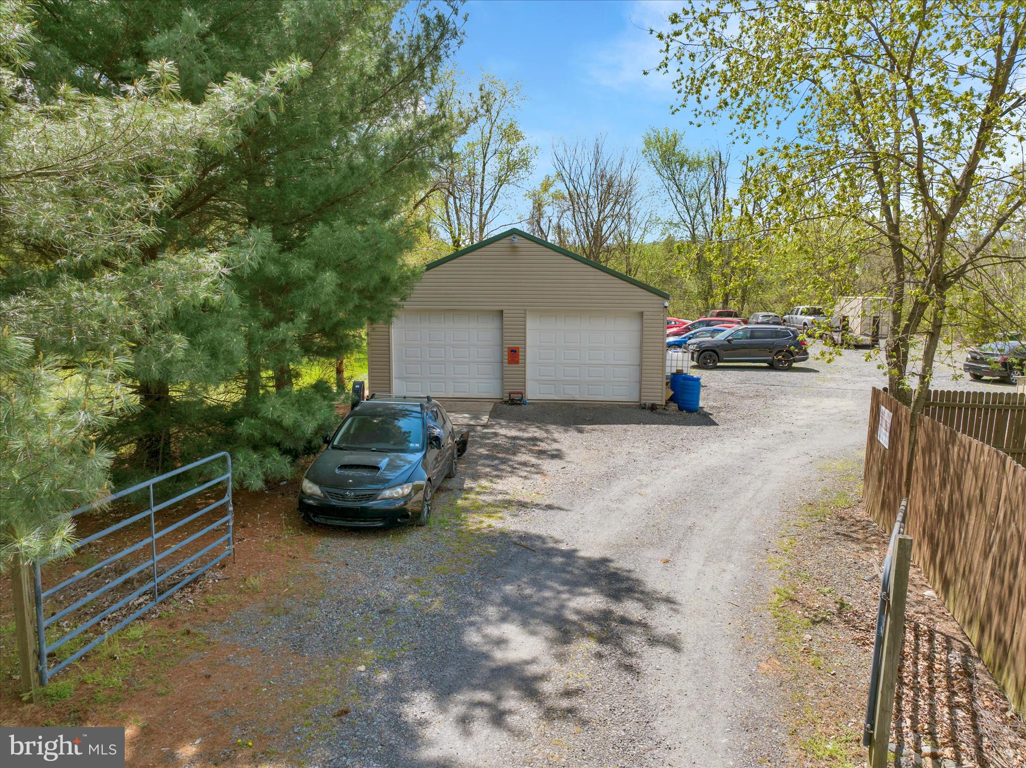 Commercial investment property with 1.33 acres. 5 current rental incomes including 3 residential units, 1 car lot and 1 pole barn. Additionally you can rent space out in the rear of property for more income. Total income as of end of 2025 is $49,980. This is a money maker and a great opportunity! (well water, public sewer, natural gas) (Property is fully rented month to month).
