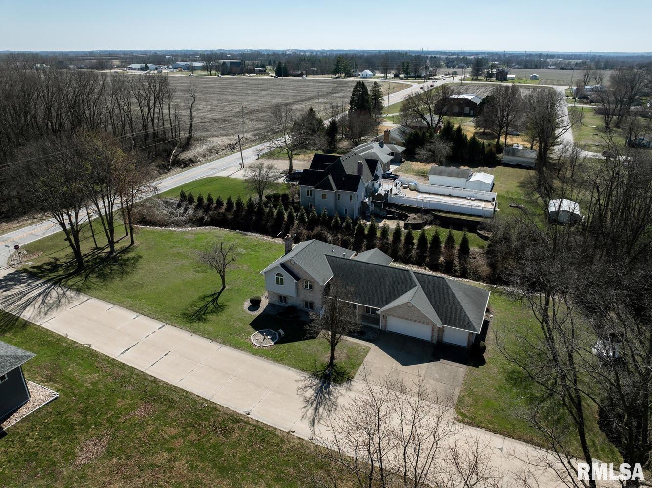 Spacious 3 bedroom, 3.5 bath split-level home offering over 2,700 sq ft in a desirable neighborhood. The main living area features vaulted ceilings, large windows, and an open layout that flows into the dining area and kitchen. A bright sunroom provides the perfect spot to relax and enjoy views of the backyard. The primary suite includes a large bedroom with vaulted ceiling, walk-in closet, and private bath featuring a soaking tub, separate shower, and double vanity. Additional bedrooms offer comfortable space for family or guests. The finished lower level provides a generous family/rec room with flexible space for entertaining, hobbies, or a home office. A dedicated laundry room with cabinetry adds convenience and storage. Outside, enjoy a spacious yard and patio area ideal for outdoor gatherings. The oversized 3-car garage provides ample room for vehicles, storage, and projects. A fantastic opportunity offering space, functionality, and great potential in a quiet residential setting.