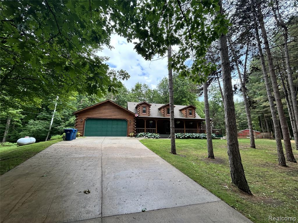 3 bed, 2.1 bath- master bathroom on main floor, 2 bedrooms and bath/shower upstairs.Wood Fireplace on main floor-2021Basement Finished with electrical fireplace, bar, 1/2 bath and laundry room.Central VacuumPropane tank is owned stays with home.AC- central air 2019Shingles Nov 2021Furnace Dec 2024Kitchen Aid Oven 2022House Fence installed 2022Generac installed 2022Home built 2000Septic tanks pumped 2025Fireplace cleaned 20252.5 garage attached to house insulated 2024.1,854sqft on 20 acres with a . 5 mile trail cleared in a circle.52x40 Pole barn with electricity and water with external generator hook up with two horse stalls and a 40x12 dog run. Fenced garden and compost pile.