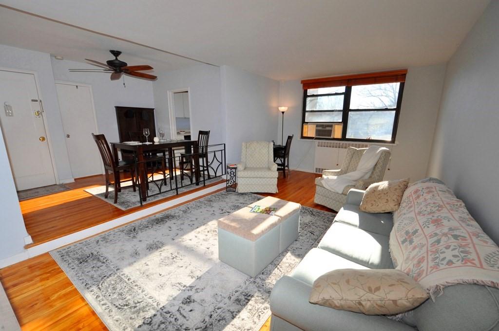 Bright & Renovated 1-Bedroom Garden-Style Co-op – Just Steps from Hartsdale Village & Train.  Welcome to Country Club Ridge, the closest garden-style co-op community to Hartsdale Village and Metro-North station—an unbeatable location that offers both charm and convenience. This bright and sunny 1-bedroom Co-op features a spacious, sunken living room with serene tree-top views and plenty of space for a home office setup.  The open dining foyer overlooks the living room, creating a seamless layout that’s perfect for both everyday living and entertaining. You'll love cooking in the fully renovated kitchen, designed with white quartz countertops, stainless steel appliances, custom white cabinetry, a striking herringbone tile backsplash, new porcelain flooring and a window for natural light and fresh air.  The oversized bedroom easily fits a king-size bed, nightstands, a dresser, and a cozy reading chair, plus offers two large closets for excellent storage. As well as a large private storage area downstairs. Additional highlights include a renovated bathroom, four generous closets (including a walk-in), and beautiful hardwood floors throughout—all move-in ready!  Country Club Ridge is the only garden-style complex in East Hartsdale Village featuring an in-ground pool, and it’s within a 5-minute walk to downtown, shops, and restaurants. Community amenities include a playground, resident garden, BBQ/picnic area, and on-site laundry rooms. Each unit comes with 1 free unassigned outdoor parking sticker.  No Pets allowed. Maintenance is $910.53 prior to STAR credit of approx. $97 month.