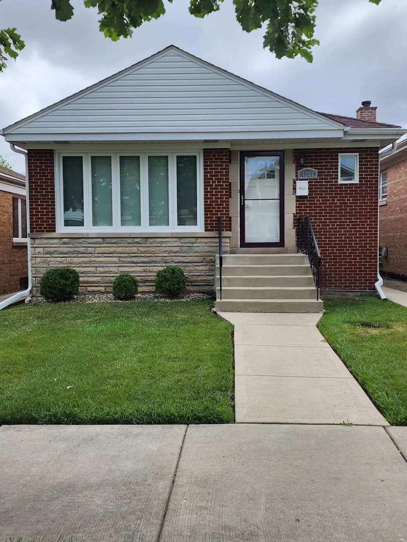 Welcome to this exceptional property located on the Northwest side of Chicago. This impeccably maintained home offers an array of desirable features, making it an ideal choice for those seeking an effortless and enjoyable lifestyle. Extremely well-maintained 3 bedroom 2 bathroom solid brick ranch with fully finished basement. 2-1/2 car garage. Hardwood Floors throughout. Three bedrooms conveniently situated on the main floor. This home offers ample space for relaxation and privacy.  The fully finished basement provides an additional living area and bedroom complemented by a bath and a kitchen.  Excellent location in much desired Edison Park.  This prime location provides residents with easy access to amenities and services, making it an attractive choice for those seeking a convenient and comfortable urban lifestyle.