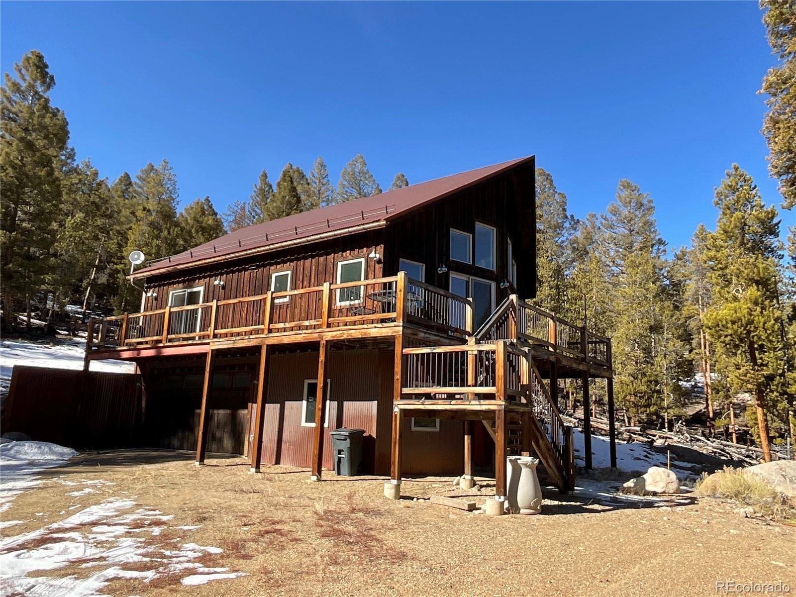 This gorgeous open floor plan custom home sits on 5.45 private wooded acres. It was constructed by Benney Builders in 2015 and features bamboo flooring throughout the kitchen, living and bedroom areas with stunning vaulted pine ceilings. Enjoy views from living areas and the wrap-around composite wood deck. Mornings provide ample eastern light and warmth through dramatic picture windows. The entry level features an attached garage and a large unfinished mud room which would be perfect for: ping-pong, a pool table, office space or an art / music studio. The mechanical room is spotless. This welcoming mountain home shows pride of ownership and is ready for you to start making your own special Twin Lakes memories.