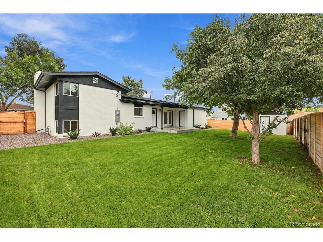 Coming soon! Showings begin 9/22/26. Open House 9/26/26 11-1pm. Welcome to this gorgeous mid-century modern tri-level, ideally situated on a large corner lot in the highly sought-after Allendale neighborhood! Completely remodeled inside and out by a custom builder, this home blends timeless character with modern finishes and exceptional attention to detail. Freshly painted brick, professional landscaping and all-new concrete create wonderful curb appeal. The spacious, fully fenced backyard offers plenty of room to relax, play or entertain, while the expansive patio is ready for summer barbecues and evenings with friends. Step inside to discover warm natural wood flooring and a spacious great room filled with sunlight from the new windows. The inviting dining room features French doors opening directly to the patio, creating an effortless connection between indoor and outdoor living. At the heart of the home, the stunning chef's kitchen features stylish two-tone cabinetry, quartz countertops and stainless-steel appliances-a fresh, functional space designed for both everyday living and entertaining. Upstairs, you'll find two generously sized bedrooms and a beautifully updated full bathroom. The lower-level family room is anchored by a handsome brick fireplace, making it the perfect place to gather or cozy up on crisp Colorado evenings. The professionally finished basement provides two additional bedrooms that could also serve as private guest rooms, home offices, a workout space or hobby rooms-giving you tremendous flexibility as your needs change. A new furnace, 2 car garage & extensive updates add comfort and peace of mind. With shopping, dining, schools and everyday conveniences nearby-and both I-70 and the light-rail station just a few miles away-this location makes getting around the metro area remarkably easy. Beautifully remodeled, move-in ready, designed for the way you live, this exceptional Allendale home is the perfect place to put down roots and call HOME!