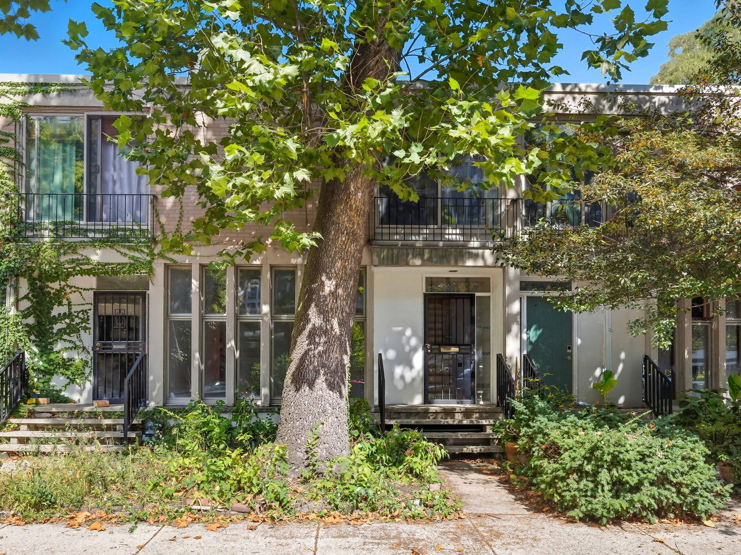 One of the most sought after town home coops in Hyde Park. It's a great place to enjoy communal living with the autonomy of a single family home. This perfectly located home gets flooded with natural light from the southern exposure. From the front door you enter into a very spacious living room with beautiful hardwood floors, the flow through the kitchen or the dining area makes everything on the main level of the house very accessible, including access to the private patio area. upstairs there are 4 nice sized rooms and 1 bathroom 3 of the bedrooms have mini-split air conditioning units and the 4th has an in wall unit. The basement is semi finished with a family room and a utility/storage/laundry area. There is a wonderful shared play area and fire pit area. Just 1 block from Trader Joes and a few steps to public transportation. Parking for 1 car is available but not assigned.