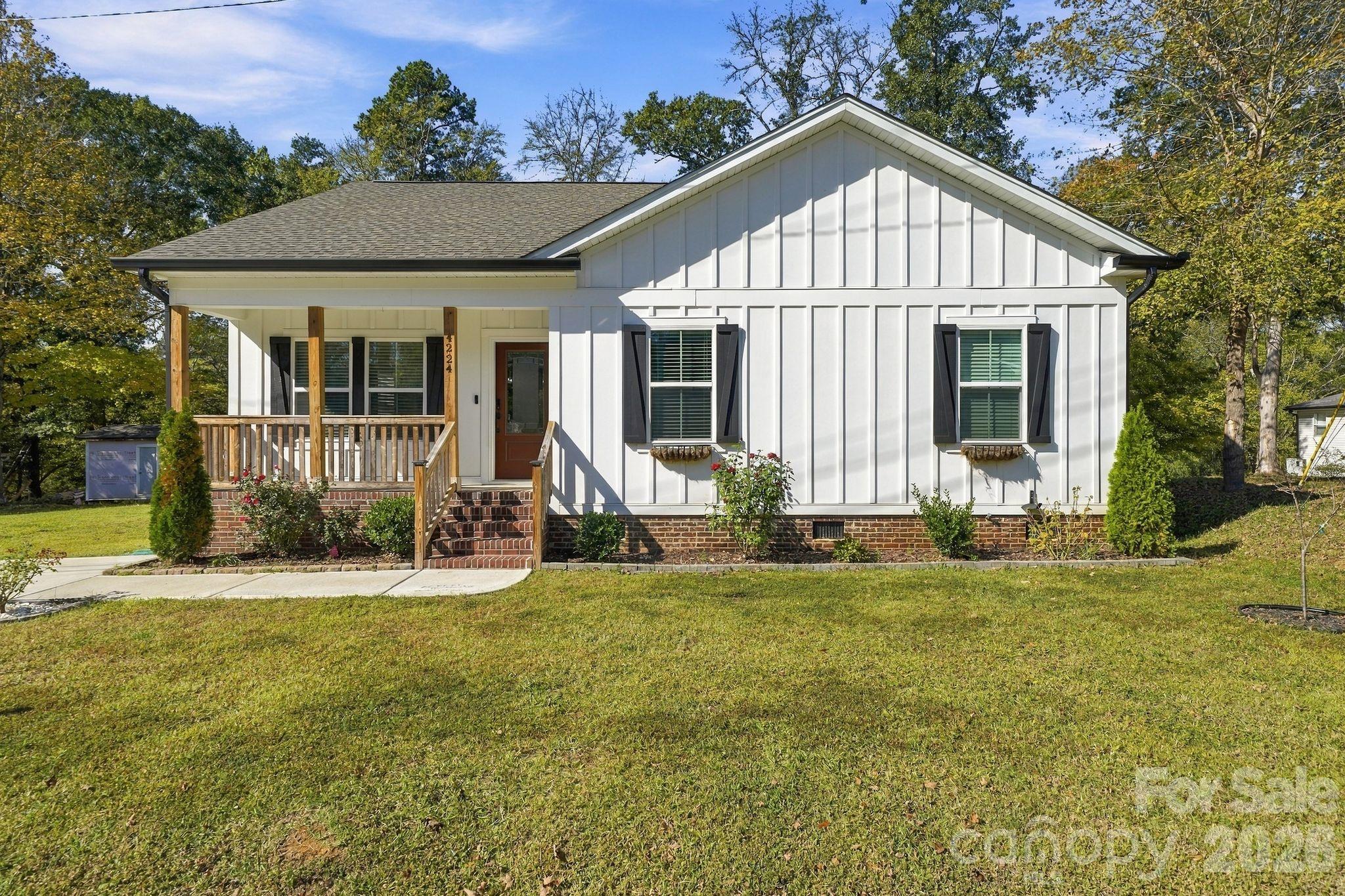 Built in 2024 and lovingly cared for by its sellers, this 4-bedroom, 2-bath farm style home gives you all the benefits of new construction without the wait or the extra costs of building. This move-in ready open floor plan feels bright and inviting, with beautiful fixtures throughout. The kitchen centers on a large island for gathering with guests. Custom built-in closets add smart storage and a polished touch. The primary suite offers you great space, and three more bedrooms give you room for guests, a home office, or hobbies. The home sits on a spacious 0.54-acre lot, which is rare for newer construction and leaves room to play, garden, or entertain. It’s just outside of the desired Harrisburg, minutes from I-85, with shopping, dining, and everyday amenities nearby. Homes this new, this well kept, on this much land don’t last long. Schedule your showing today! Professional home pictures and floor plan to be updated on 10/28/2026