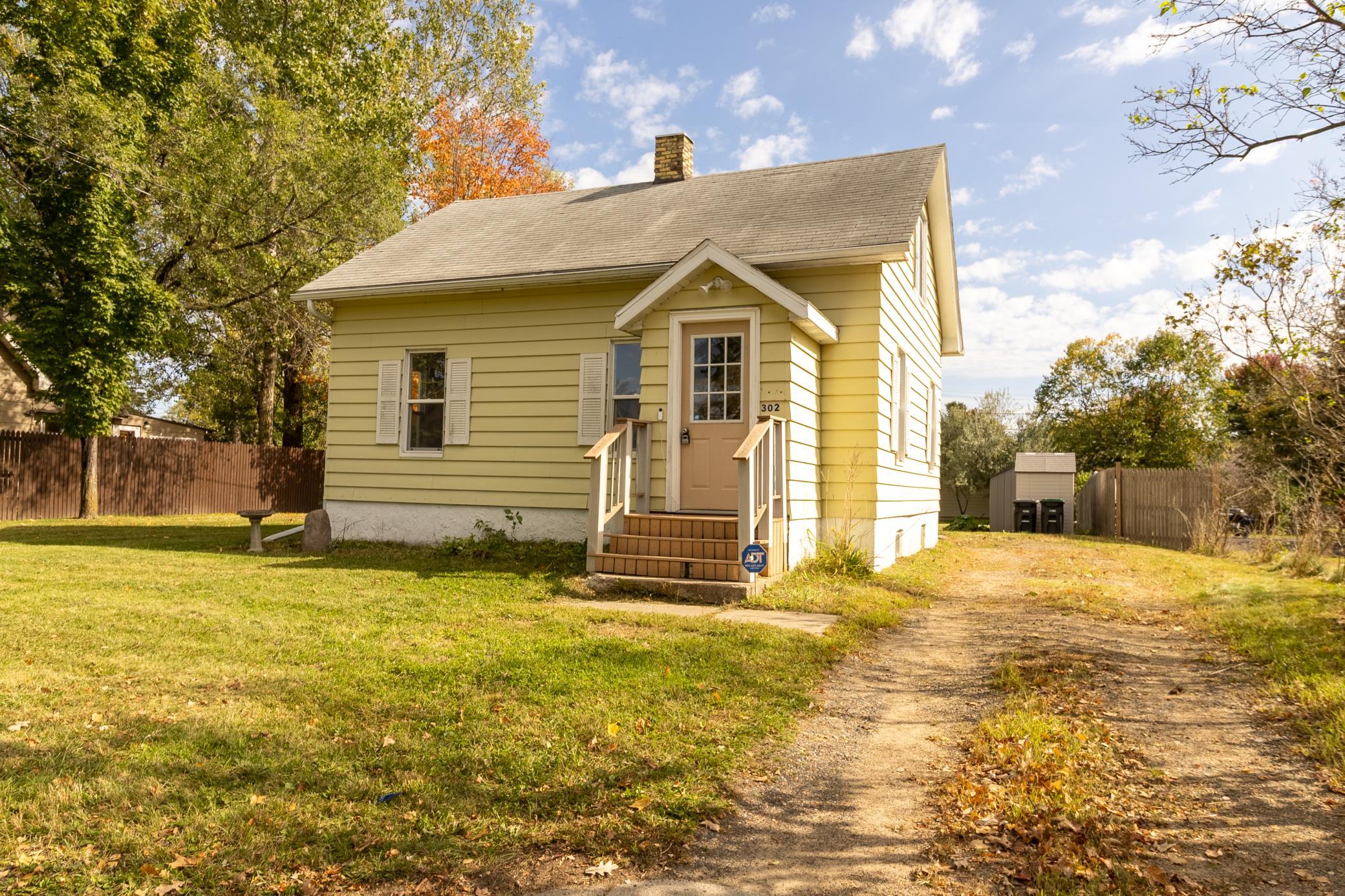 Spacious lot with adorable 3 bedroom 1 bath 1.5 story home!  Many updates over the years in this affordably priced home - seamless gutters, electrical, furnace/AC, bathroom and kitchen, doors & more!  The spacious yard is ready to enjoy!  Storage shed included for lawn mower, shovel, bikes or toys!