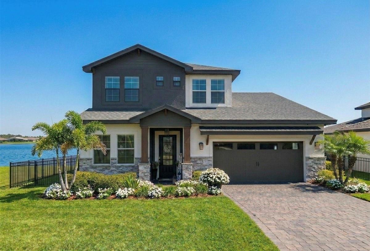 Discover one of Florida's finest lakefront homes for sale on Lake Alfred — a stunning custom-built 4-bedroom retreat completed in 2021. Whether you're relocating to Florida, searching for a lake home in Central Florida, or dreaming of a waterfront lifestyle near Orlando, this property delivers an extraordinary combination of modern construction, breathtaking lake views, and unbeatable location.Wake up to panoramic sunrise views over Lake Alfred from multiple living spaces. With direct lake access and a private 100-foot dock, every day is an invitation to boat, jet ski, fish, or simply enjoy the peaceful rhythms of Florida lakefront living. The oversized backyard lot — among the largest in the community — offers endless potential to create your own private outdoor oasis, whether that means a pool, summer kitchen, or serene lakeside retreat.Thoughtfully designed with high-end custom finishes and a smart, functional layout, this home features four spacious bedrooms plus a dedicated office — perfect for remote workers, growing families, or anyone who needs flexible living space. The 2021 construction means low-maintenance living with all the reliability of modern building standards.From the luxury primary suite with a rainfall shower and stand alone tub, to the 4 panel oversized sliding doors leading to a well sized enclosed patio with a wooden tongue and groove ceiling, you will experience a true custom built home.