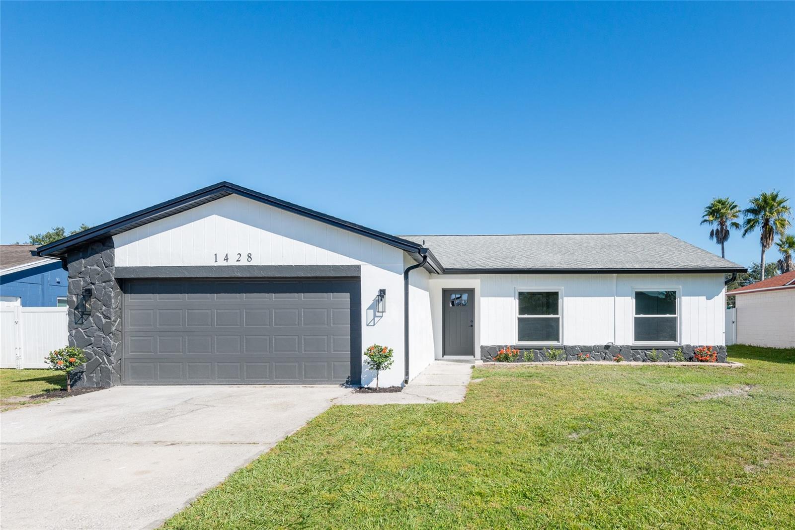 Welcome to Heather Lakes Community where this 4-bedroom 2-bath home is located with a 2-car garage. NO HOA or CDD. The Owner has updated the exterior with New Soffit, Facia, Rain Gutter and Paint. Inside the home features new Luxury Vinyl Planks, new baseboards, new doors and closet doors. All Popcorn has been removed from ceilings and replaced with fresh texture to give a cleaner look. The Kitchen has been renovated and features new wood cabinets, quartz countertops, all stainless-steel appliances along with tile backsplash. New AC. Windows have been updated throughout. Out back is a nice sized screen porch with new door and new screen all around it with a fenced in back yard. This home is truly move in ready.