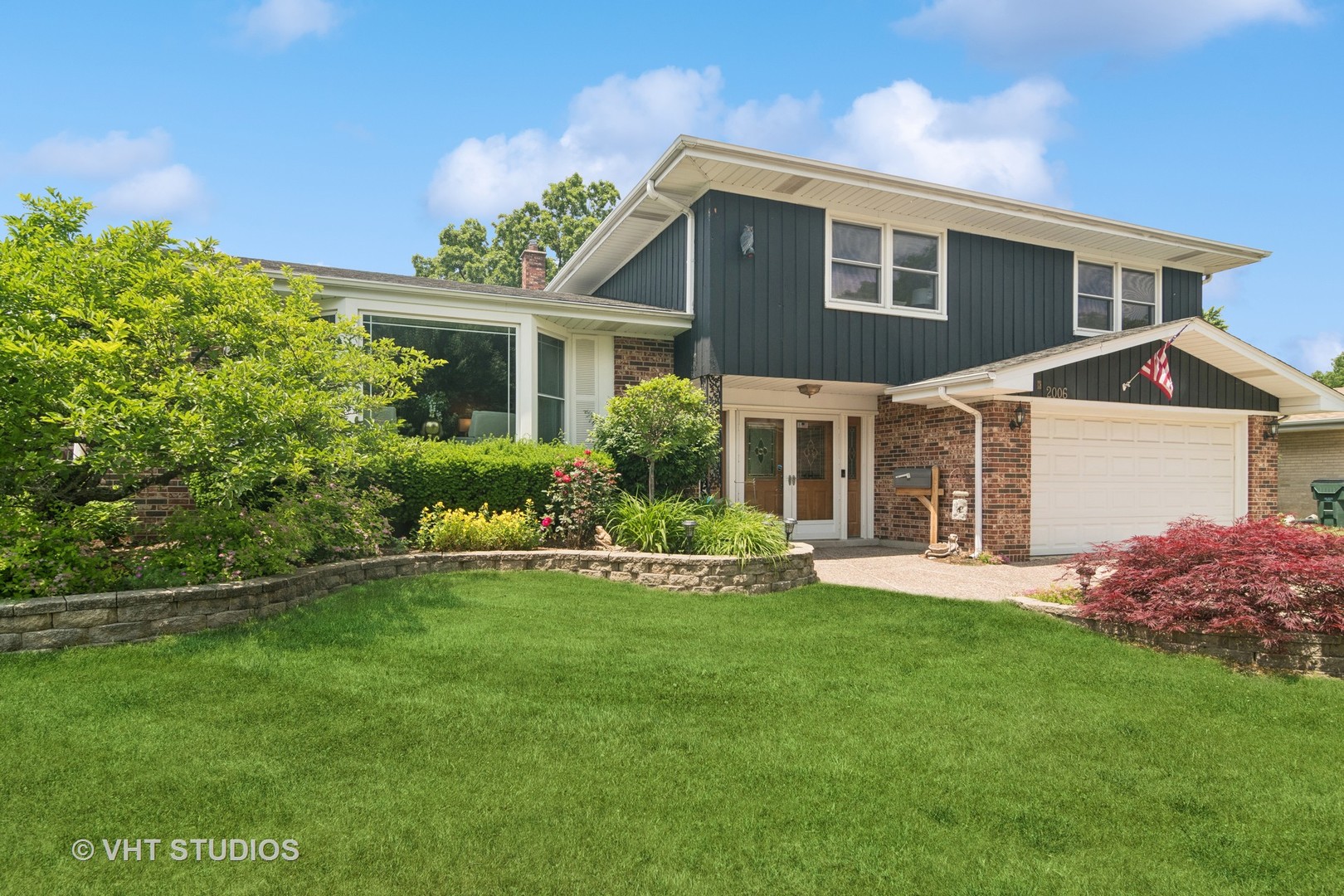 This one-of-a-kind Ivy Hill home was originally a model for the neighborhood and is larger than similar floorplans. The amazing kitchen space will be the heart of your home-with ease of flow and functionality plus valuable cabinet space, endless countertops, a 2nd sink, and stainless appliances providing you with opportunity for uncluttered living, multiple prep and serving areas, a coffee or beverage station, and ease of gathering with friends or family.  Large windows provide lovely yard views and natural light across the entire room.  The breakfast nook is the perfect spot to enjoy morning coffee or mealtime. A few steps away you'll find the generously sized Family Room with a corner fireplace and easy access to the patio making it easy to extend your living outside.  This level has a large half bath and a storage closet perfect for games or backyard gear. We like the idea of adding a desk near the stair wall for a homework or hobby zone. Spend time in the living room quietly reading, watching neighborhood activity, or gathering with friends for drinks or game night. The entire home is built for a lifetime of memories. Upstairs you'll find a primary bedroom with a walk-in closet and private bath plus 3 additional good-sized bedrooms and a hall bathroom with a jetted tub/shower combination. There are hardwood floors under the carpeting in bedroom 3. Other interior upgrades include recessed lighting, new oak hardwood floors in the living room and stairs to 2nd level, and replacement of all doors & windows. The sub-basement provides another level of living space perfect for a playroom, exercise, entertainment area, or private office. Outside relax or entertain on the large patio overlooking the grassy yard. Mechanical updates: Furnace and A/C (2021), new chimney liner 2016. The home is approximately 2 blocks to top rated Ivy Hill elementary school, close to Camelot park, pool, and playground, and a few blocks to Lake Arlington recreation area. Close to abundant shops, restaurants, & conveniences, & a short drive to popular downtown Arlington Heights. A trifecta of award-winning schools-Ivy Hill Elementary, Thomas Middle School, and Buffalo Grove High School is icing on the cake!