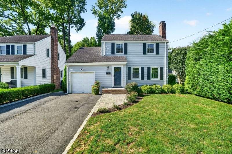 Welcome to 856 Rahway Avenue! A charming 3-bedroom, 1.5-bath Colonial offering a wonderful blend of timeless charm and inviting warmth. Hardwood floors flow throughout the home, beginning with a spacious living room featuring a wood-burning fireplace and continuing into the dining area and bright kitchen with white cabinetry, stainless steel appliances and a breakfast nook. A sun-filled bonus room provides flexible space for a home office, sitting room or playroom. Upstairs are three nicely sized bedrooms and a full bath. The finished basement offers additional living, laundry area and recreation space. Outside, enjoy a newer patio, fenced backyard and beautifully landscaped grounds that add to the home's curb appeal and provide an inviting setting for relaxing or entertaining. The attached one-car garage offers convenient access into the home, especially helpful when bringing in groceries or coming home in inclement weather and is equipped with electric car charger. Ideally located within walking distance of all 3 Westfield schools, Tamaques Park and vibrant downtown Westfield with its shopping, dining and transportation options. A wonderful opportunity to make this Westfield home your own!