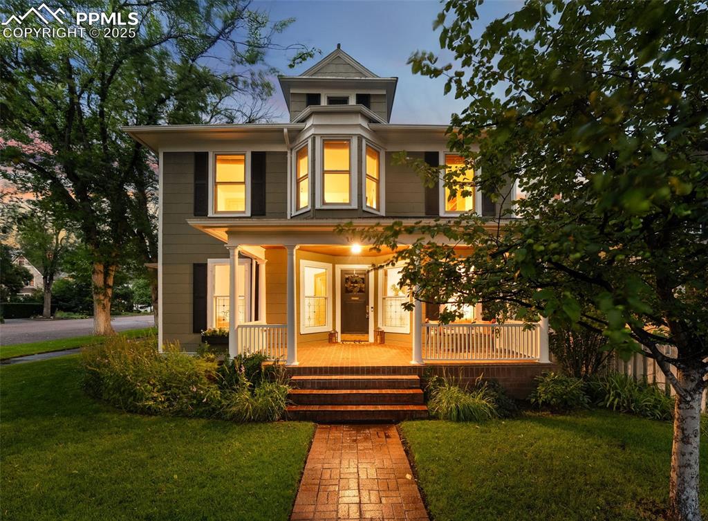 Nestled in the heart of the coveted Old North End, this beautifully preserved five-bedroom, two-bath home blends rich historic character with fresh modern updates—offering that rare mix buyers dream of. From the moment you arrive, you’ll be drawn in by the undeniable curb appeal: lush landscaping, a welcoming covered front porch, and decorative custom double-pane Scottish glass windows that add both elegance, privacy and efficiency.

Inside, original hardwood floors create warmth and charm, while natural light floods every corner of the thoughtfully designed layout. The spacious living and dining areas flow seamlessly, and the eat-in kitchen maintains its quaint appeal while offering plenty of functionality. Fresh interior paint make the entire space feel bright, clean, and move-in ready.

You’ll love the versatility this home offers—whether it’s the big finished attic with endless potential (playroom, studio, home office—you decide!), the fully finished basement with great storage, or the enclosed back patio that’s perfect for morning coffee or evening wind-downs. The extended driveway even has room for basketball or extra off-street parking.

All of this, set in one of Colorado Springs’ most iconic neighborhoods—where tree-lined streets, historic architecture, and a strong sense of community create an unmatched lifestyle. Parks, trails, downtown shops and dining are just minutes away.