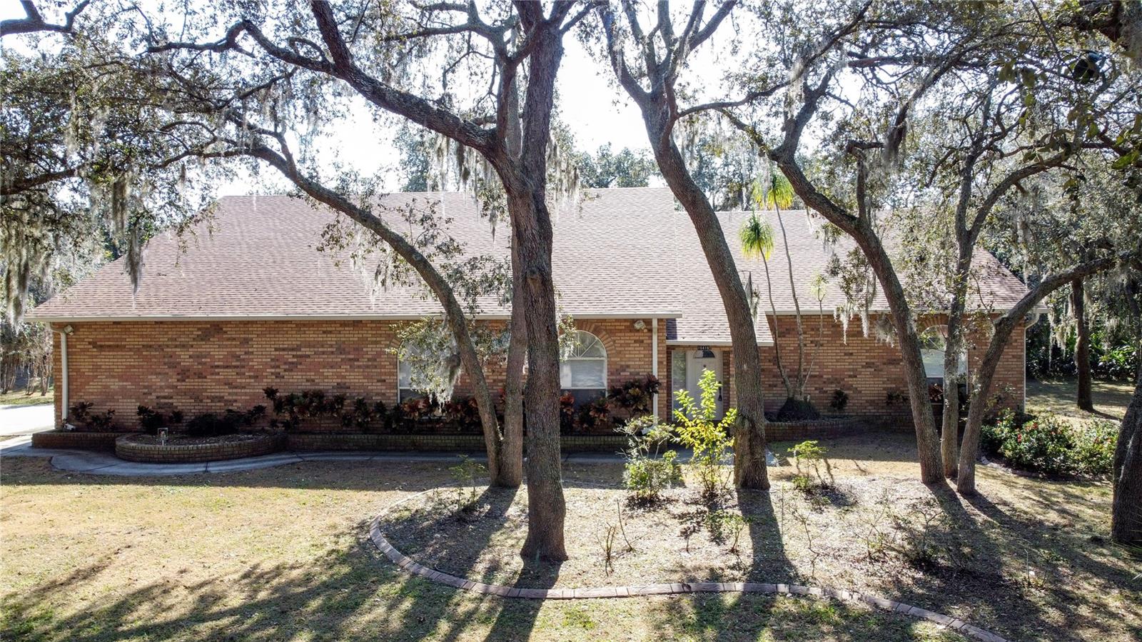 Fantastic location on a quiet cul-de-sac with NO HOA. This home has endless possibilities with some renovations. Their is an attached in law suite with it's own entryway and single car garage. The laundry room is shared and separates the in law suite from the main living area. The second floor is located over the garage with the entry through the garage, it has two large rooms. The main house has large rooms, vaulted ceilings and an open floor plan. The home is being sold AS IS. Easy commute to Orland and area attractions.