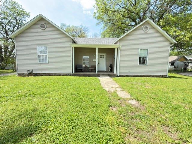 Move-in ready 3-bedroom, 1.5-bath home in Lamar, MO!This recently remodeled home features a spacious open floor plan, perfect for everyday living and entertaining. The kitchen offers newer stainless steel appliances, beautiful wood countertops, and newer painted cabinetry. Just off the kitchen, you’ll find a large laundry room, and all appliances—including the washer and dryer—stay with the home.The main bedroom includes its own convenient half bath, while the full bathroom is located in the hallway. Outside, enjoy low-maintenance living with vinyl siding, vinyl windows, and a composite roof.Step into your private, fenced backyard—ideal for relaxing evenings—with easy access to the detached 2-car garage or hobby shop. Located on a quiet street lined with mature trees, this home offers both comfort and charm.
