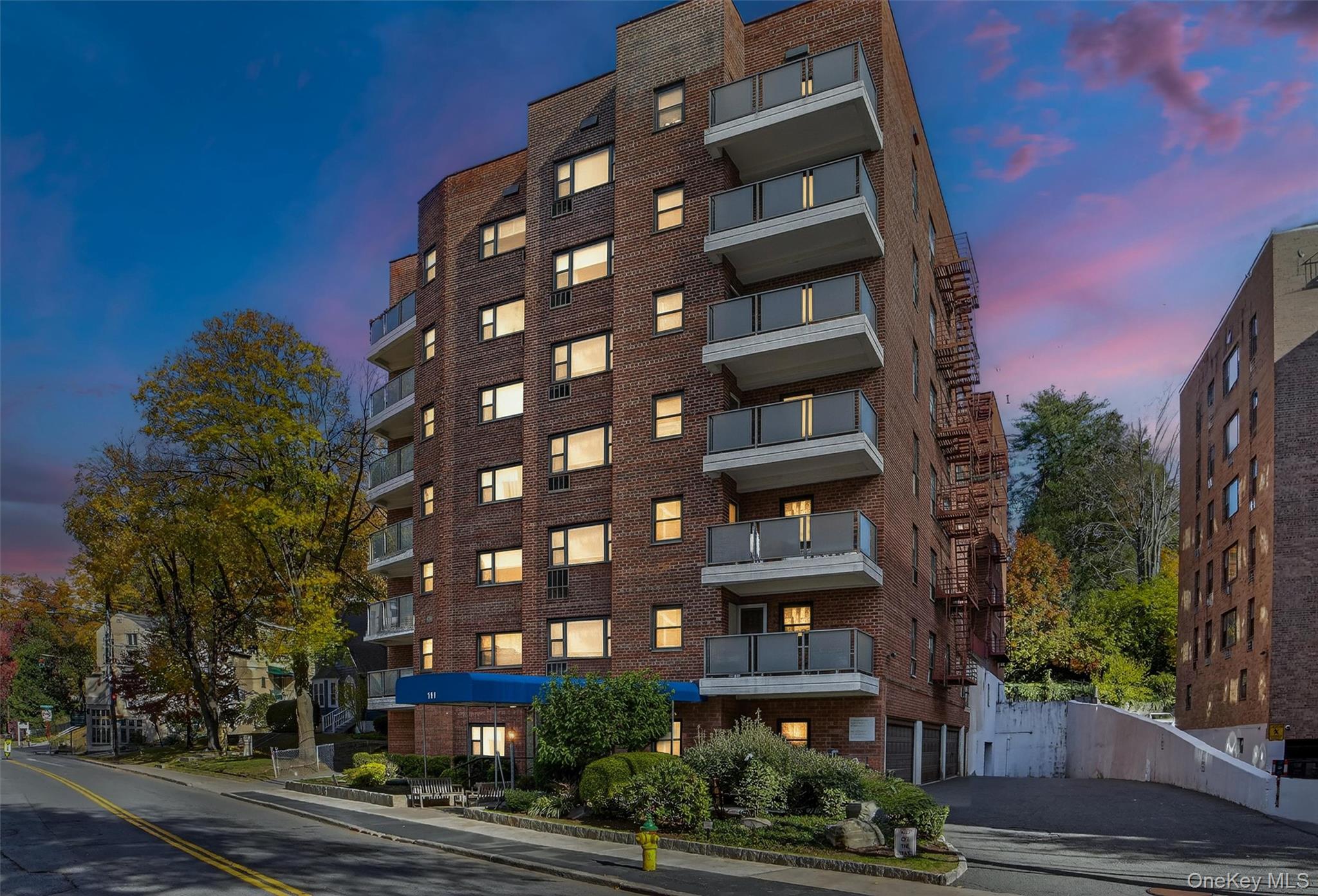 Commuter’s Dream! Bright, fully renovated corner unit 2-Bedroom Co-op with DEEDED Indoor Heated Parking.An unbeatable location for commuters—just a 5-minute walk to the Metro North station and only 35 minutes to Grand Central Terminal.This sun-drenched and beautifully renovated 2-bedroom, 1-bathroom co-op offers modern elegance, comfort, and convenience. The kitchen showcases General Electric stainless-steel appliances, new ceramic tile flooring, a custom tile backsplash, white wood cabinetry with crown molding, and gorgeous quartz countertops—perfect for both everyday living and entertaining.The bathroom has been fully updated from floor to ceiling, featuring ceramic tile floors and walls, a new vanity and toilet, and a sleek glass sliding door for a clean, contemporary look.Every detail has been thoughtfully upgraded, including custom blinds and shades in every room, two new in-wall air conditioners, new interior doors and hardware, and modern light fixtures throughout. The home also features ample closet space, beautifully refinished hardwood parquet flooring, and elegant base molding that adds warmth and character.Enjoy the convenience of your DEEDED indoor heated parking space—no wait list! Storage when available is just $30 per month. Building amenities include a community laundry room and a playground located at the rear of the property.Ideally situated close to parks, shopping, dining, and entertainment, with easy access to seasonal Bike Sundays on the Bronx River Parkway and the weekly Farmer’s Market.This pet-friendly co-op welcomes up to two cats or one dog (25 lbs. max).Move right in and start enjoying all this exceptional home and neighborhood have to offer. Don’t miss this opportunity—schedule your private showing today!