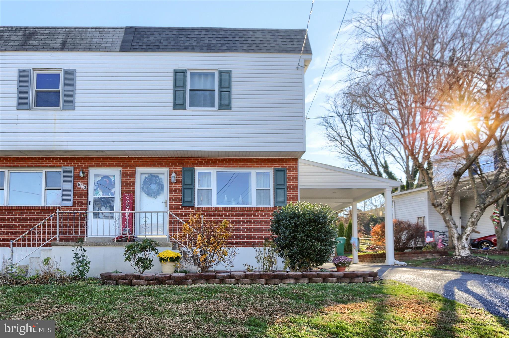 OFFERS: An offer has been received; all offers are requested no later than 6 pm on Sunday, November 30. Welcome to 608 Erford Road, a beautifully maintained semi‑detached home in Camp Hill, adjacent to Ridley Park — where weekends and downtime can be spent enjoying the community’s playground, strolling the walking paths, shooting hoops at the basketball court, kayaking on the Conodoguinet Creek, or testing your skills on the disc golf course. This 3 bedroom, 1.5 bath home offers updated and comfortable living spaces filled with natural light. The kitchen has been thoughtfully renovated with soft-close cabinetry, a double sink, stainless steel appliances, quartz countertops, and a large breakfast island, making it the perfect centerpiece for everyday living and entertaining. Hardwood floors flow throughout the spacious living room and bedrooms, while the bathrooms feature modern updates, such as granite countertops.The finished lower-level family room adds additional space to relax or gather with friends, complemented by a large storage area. Practical upgrades include a tankless water heater, natural gas heat and cooking, and replacement windows for efficiency and peace of mind. Outside, the fenced rear yard with a patio, mature landscaping, private driveway, and covered carport add both charm and convenience. With quick access to major highways, shopping, schools, dining, and nearby parks, this home combines affordability, comfort, and location, making it the perfect choice for your next chapter.