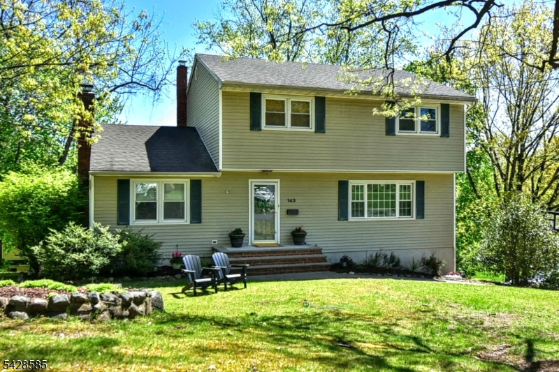 Welcome to this wonderful Center Hall Colonial residence located within the Ramsey Golf & Country Club, a lifestyle community. Natural light pours into the Formal Living Room and Dining Room onto glistening hardwood floors. The resident chef will enjoy preparing and serving meals in the Modern Eat-in Kitchen with sliding doors to the deck. The Family Room with cathedral ceiling and wood burning fireplace will be a great place to curl up with your favorite book on chilly nights. The Primary Bedroom and Bath will be your retreat at the end of the day. There are three additional bedrooms with large windows and ample closets. A full bath modeled in warm tones complete the upper level. The lower level of the house has a Recreation/Media area and access to the two car garage. Ramsey Gold & Country Club offers a lake, 18 hole golf course, pool, paddle tennis/pickleball and stunning new club house (membership is required.) We are looking forward to seeing you at the next Social Event. The Town of Ramsey is a commuter's delight. Ramsey has award winning schools. Enjoy the downtown shopping area, restaurants, town pool and parks. Explore our Sunday Famer's Market at the Train Station.
