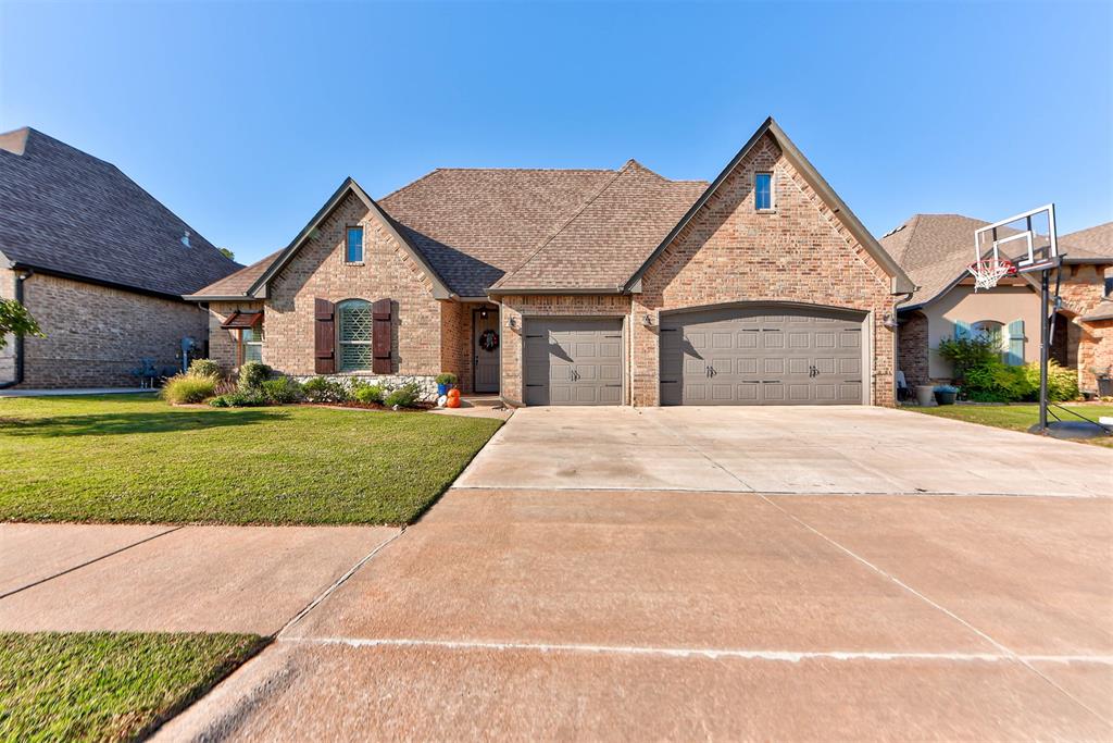 Charming and beautifully designed, this Stonebriar Addition home offers 2,122 square feet of inviting living space with 3 bedrooms, 2 bathrooms, a dedicated office, and a 3-car garage. The open-concept living, dining, and kitchen areas create a warm, welcoming atmosphere, highlighted by vaulted ceilings with exposed wood beam and wood-look tile flooring throughout. The kitchen features granite countertops and a distinctive brick surround framing the stove and oven, adding character and timeless appeal. A neutral color palette and tasteful design choices make this home feel both comfortable and stylish. The spacious primary suite offers a large bedroom, an oversized bathroom, and a wraparound closet, with brand-new carpet in the bedroom and closet. Double doors add charm and privacy to the dedicated office. Step outside to the covered back patio with a fireplace and enjoy peaceful views of the wooded greenbelt, creating the perfect backdrop for relaxing evenings or entertaining guests No stress with keeping the yard green with front and back yard irrigation system. The neighborhood amenities include a pool and park and well maintained common areas. With thoughtful details, inviting spaces, and charming character, this home is a wonderful place to call home!