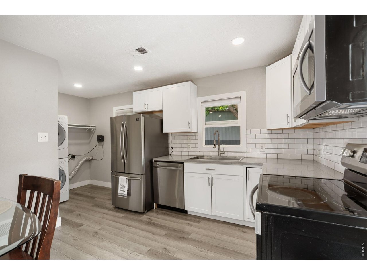 Charming bungalow-style home in the heart of Greeley! This beautifully remodeled 2-bedroom, 1-bath home offers 840 square feet of thoughtfully updated living space while maintaining its classic character. Enjoy a fully renovated interior featuring modern finishes and a bright, inviting layout.Outside, you'll find a fully fenced yard perfect for pets, gardening, or entertaining. The impressive detached 15' x 30' garage/shop provides ample space for vehicles, hobbies, storage, or a workshop, with convenient alley access.Located in an established Midtown neighborhood with access to shopping, dining, parks, and schools, this move-in-ready home is an excellent opportunity for anyone. Don't miss your chance to own this turnkey property! Pre-inspected for your peace of mind.