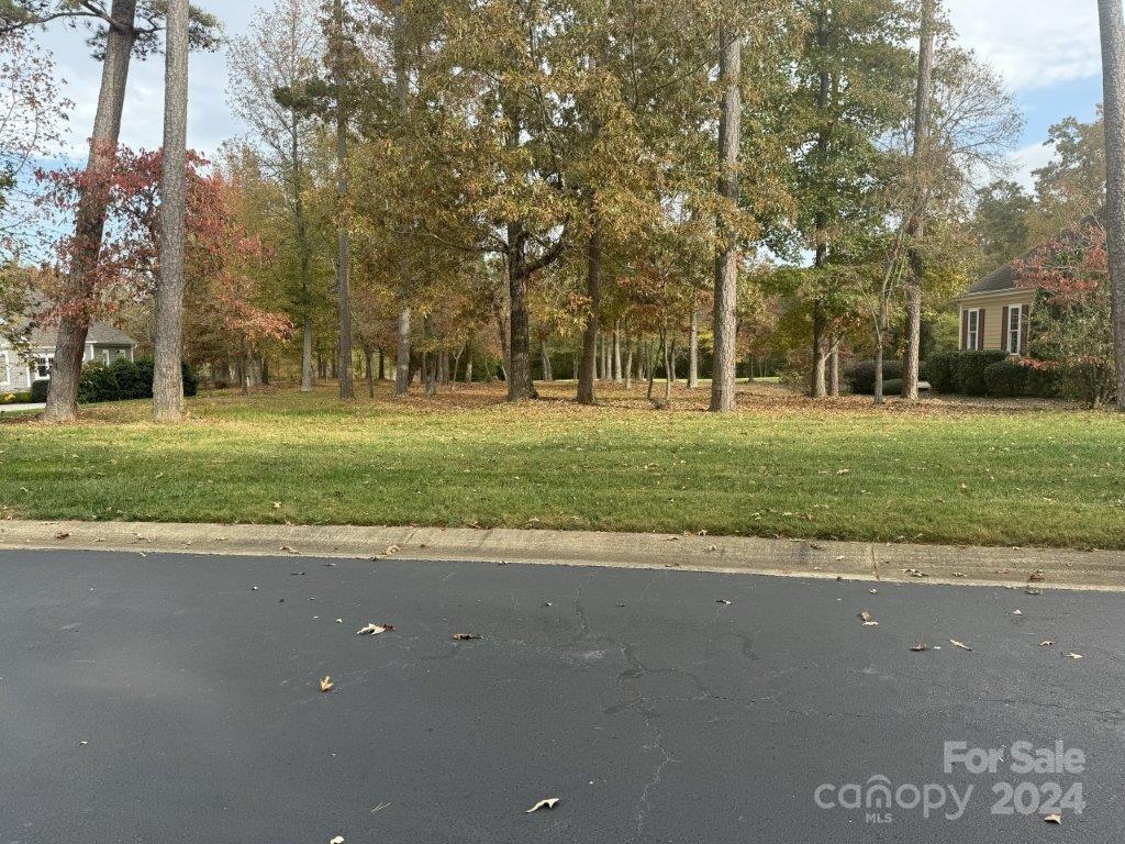 Beautiful, level home site that offers a terrific building site. Great views of the 4th fairway of the recently renovated Old North State Club 18 hole Tom Fazio designed golf course. The lot has over 100' of golf course frontage. Located within walking distance to the onsite Marina and walking and biking paths. Old North State Club members enjoy many recreational amenities which include tennis and pickleball courts, swimming pools, fitness center, lakefront guest lodge, marina, and full service clubhouse.