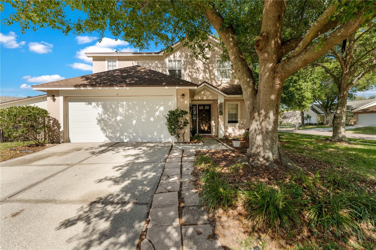 **Public Remarks (2,789 characters)**Located in the Pebble Creek community, this remodeled 3-bedroom, 3-bath home at 9758 Fox Hollow Rd offers a spacious layout, large lot, fenced backyard, and an enclosed sunroom that adds flexible living space for a home office, sitting area, or additional entertaining space. The kitchen includes a pantry and opens to the main living areas, creating a comfortable flow for everyday living and gatherings. Built-in closets throughout the home provide ample storage, and laminate flooring upstairs offers a clean, low-maintenance finish. All three bathrooms have been remodeled, and major updates include a roof replaced in 2015 and an AC system replaced in 2024. The fully fenced backyard provides room for outdoor activities, pets, or entertaining, while the sunroom extends usable interior space with views of the yard. Situated on a large lot, the property offers both indoor and outdoor functionality. Located near University of South Florida and Moffitt Cancer Center, as well as nearby shopping, dining, and grocery options including The Shops at Wiregrass and retail along Bruce B Downs Blvd. Residents of Pebble Creek have access to community amenities including a pool, tennis courts, playgrounds, and a community center. Convenient access to I-75 and I-4 allows for easy travel throughout Tampa and surrounding areas. This home combines interior updates, flexible living space, storage features, and proximity to major destinations in a convenient Tampa location. Schedule a showing to explore the layout, sunroom, and backyard space this property offers.