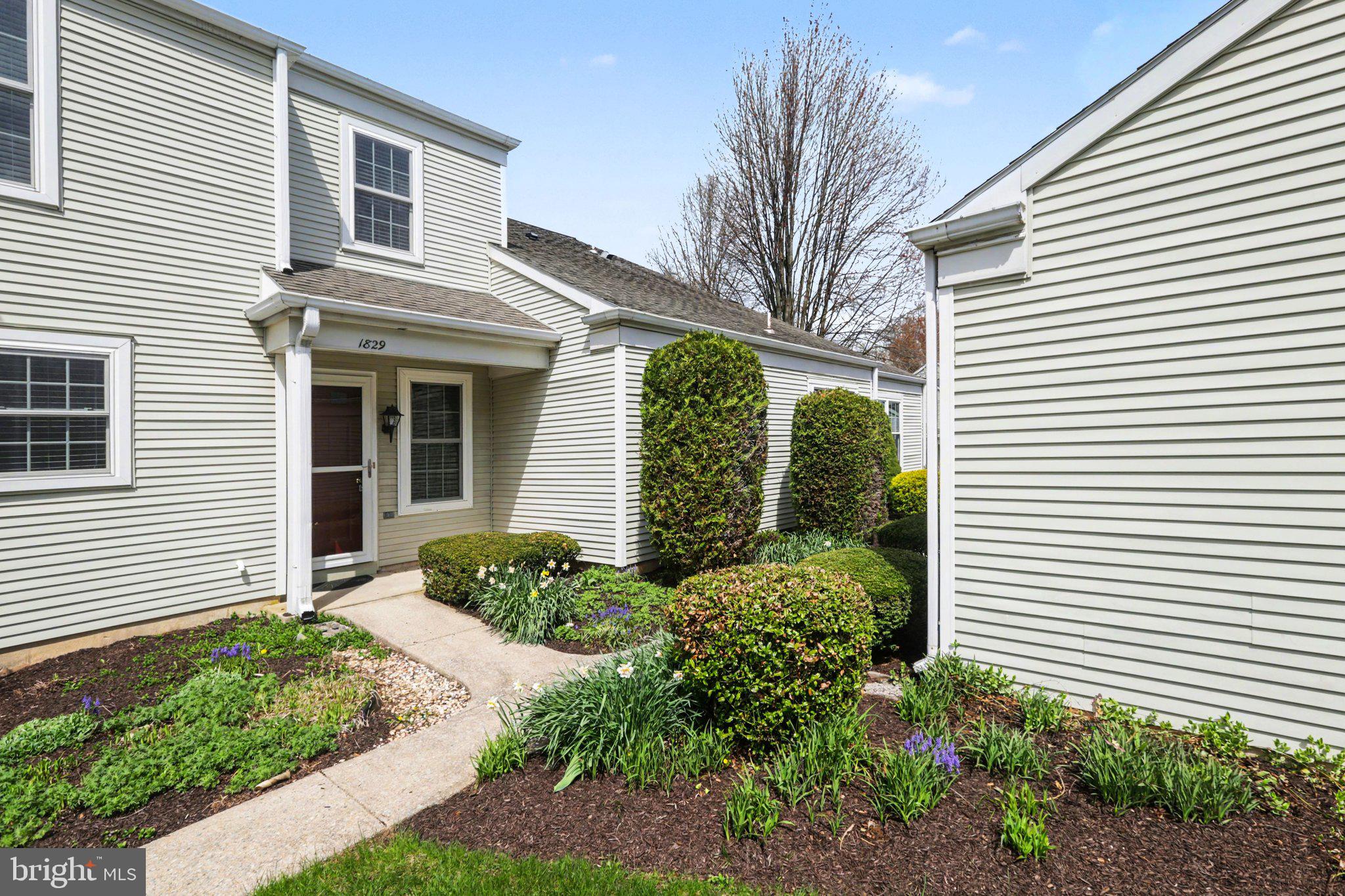 Welcome to this charming two-story townhome, ideally situated on a premium lot within the highly sought-after Rockledge Community. This well-maintained residence, located in the desirable Derry Township School District, offers the perfect blend of comfort, convenience, and community living. As you enter through the inviting covered front entry, you are greeted by a bright and welcoming foyer featuring a wall mirror, glass shelf, and a spacious guest closet providing convenient storage for coats and belongings. The first floor boasts a generous living room and dining room combination, enhanced by the warmth of wall-to-wall carpet and the cozy ambiance of a gas-burning fireplace. A sliding door opens to a sizeable sunroom filled with natural light from numerous windows, overlooking tree line, farm fields, and offering access to a practical utility/storage room. The eat-in kitchen is thoughtfully designed with wood cabinetry, ample counter space, and a full complement of appliances that will remain with the home. Additional first-floor amenities include a convenient guest powder room and direct access to the one-car detached garage. Upstairs, you will find two generously sized bedrooms with ample closet space, along with easy access to the main full bathroom and a laundry closet complete with washer and dryer that convey with the property. This desirable floor plan, combined with large rooms, sunroom, detached garage, and thoughtfully maintained grounds, makes this townhome truly special. With some personal touches, this property is ready for you to make it your own. The low monthly association fee of just $189 cover grass cutting, snow removal, plowing, exterior painting, roof repair/replacement, and upkeep of shared common areas — allowing you more time to enjoy your home and the community. Please call today to schedule your private tour.