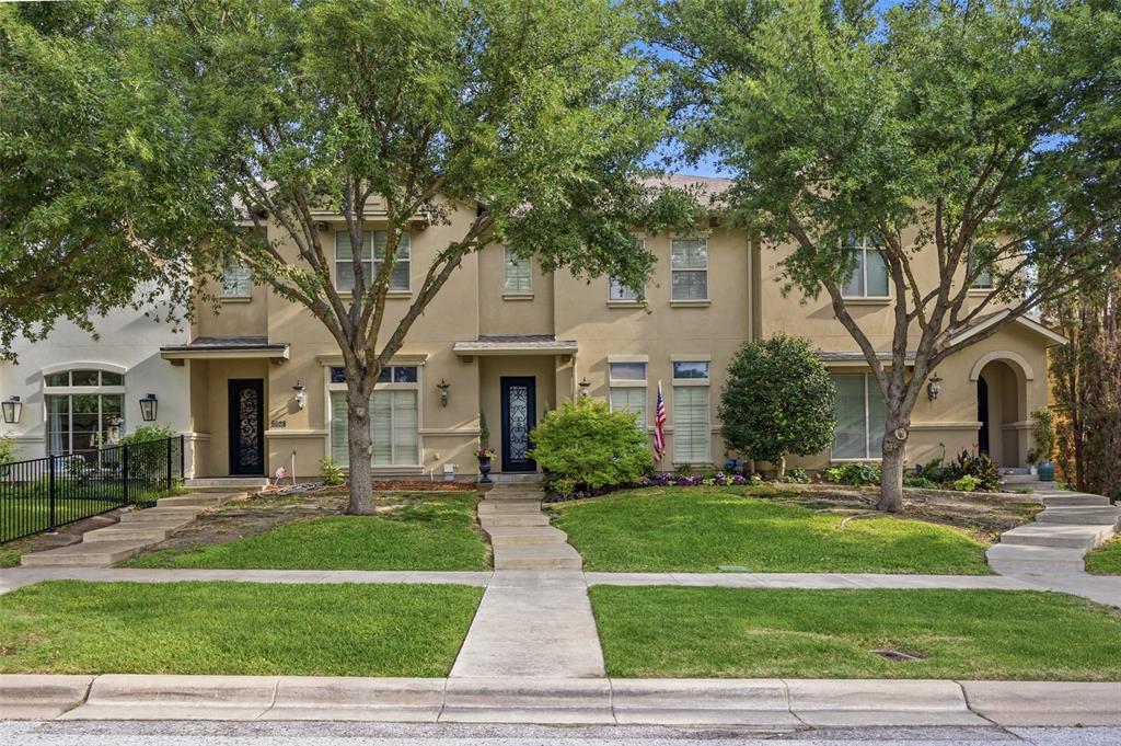 Y'all, come take a peek at this Fort Worth gem with me - right in the heart of the Cultural District.  Welcome to 5026 Pershing Avenue.  Two stories, two bedrooms, two-and-a-half baths, and just over 2,300 square feet of thoughtfully designed space - built in 2011 and kept in immaculate condition.  Step inside and your jaw will drop at this kitchen.  Natural stone and granite countertops, a huge island with breakfast bar seating, gas cooktop, stainless steel appliances, and a walk-in pantry.  Travertine tile runs throughout, and those ten-foot ceilings? Chef's kiss.  The living room is bright and open with built-ins and crown molding.  Upstairs, the master is a true retreat - deep garden tub, separate shower, dual vanities, and walk-in closets.  Private courtyard, covered porch, one-year warranty included - and you're minutes from Dickies Arena, downtown, and the best restaurants in town.  Come see it before it's gone!