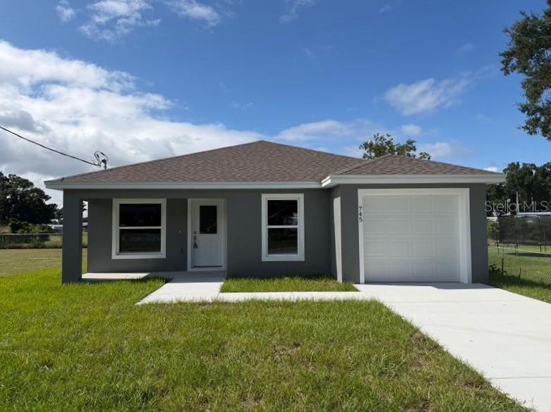 Your dream home awaits in this beautifully crafted, brand-new 3-bedroom, 2-bathroom home with a 1-car garage. Spanning a little over 1,100 square feet, this home offers a spacious living room that opens to the dining room and a slightly tucked-away galley-style kitchen. Elegant Luxury Vinyl flooring flows throughout the home! The kitchen boasts gorgeous countertops, a closet pantry, and stainless steel appliances. For added convenience, a tucked-away laundry closet sits quietly at the back of the home. The primary bedroom includes a walk-in closet and an ensuite bathroom featuring a tub/shower combo. Step outside to enjoy your morning coffee on the welcoming front porch. USDA location! Don't miss your chance to be the first owner of this beautiful home. Call us today.