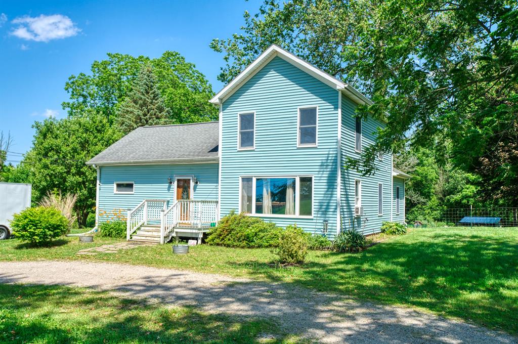 Homestead sweet homestead! You can have it all on this gorgeous 15 acre parcel.  Prime hunting w abundant turkey & deer, plenty of room for horses, chickens or whatever your heart desires. The home features a much more open floor plan than you would expect for a farmhouse of this age.  Main floor laundry & primary suite with patio door out to deck make it the ultimate retreat.  The kitchen has ample countertop prep space & plenty of storage. Hearth room features a wood burning stove capable of heating the entire home and tongue and groove knotty pine for an up north cabin feel perfect for showcasig trophies or settling in with a good book!  There are lovely trails through the acreage & a gazebo w a natural stone fireplace ready for outdoor entertaining.  Country lifestlye awaits!