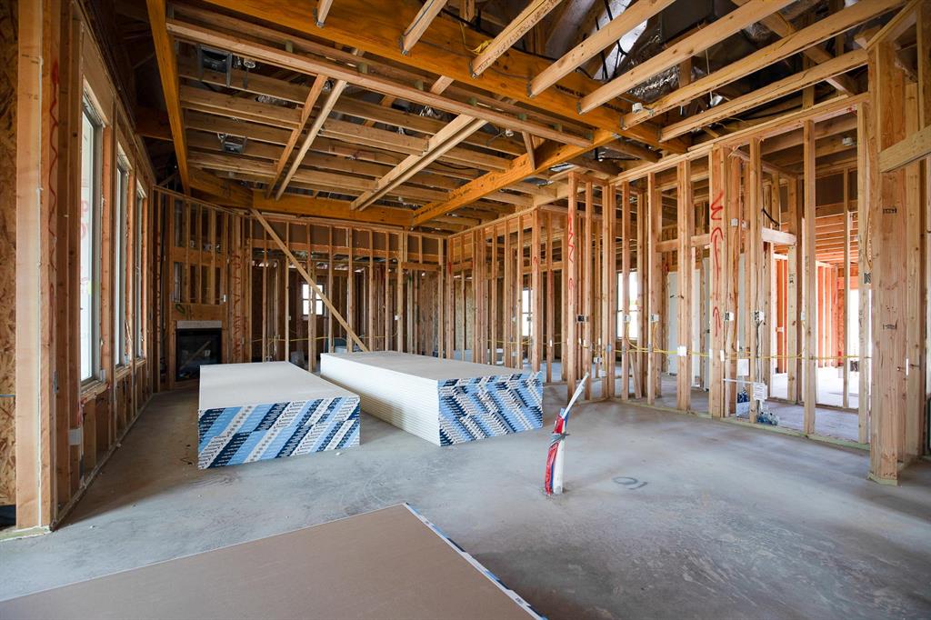 The Hazel floor plan has a total of 2,095 Sqft for living space, including 1,900 Sqft of indoor living and 220 Sqft of outdoor living that features a wood-burning fireplace, a gas line, and a TV hookup! This immaculate home offers 4 bedrooms, 2 full bathrooms, covered patios, a utility room, and a 3-car garage with an in-ground storm shelter installed. The great room presents a beautiful coffered ceiling with a ceiling fan, a gorgeous corner gas fireplace with our stacked stone detail, large 7’ windows, rocker switches throughout, and elegant wood-look tile. The high-end kitchen has stainless-steel appliances, including a 5-burner cooktop, decorative tile backsplash, custom-built cabinets to the ceiling with under cabinet lighting and cabinet hardware installed throughout, a large corner pantry, 3 CM countertops, more wood look tile, stunning pendant lighting, and an oversized center island that holds a spacious sink, a dishwasher, and a trash can pullout. The primary suite spotlights a sloped ceiling detail with a ceiling fan, windows, and our cozy carpet finish. The spa-like prime bath has a free-standing tub, a dual sink vanity with framed mirrors, 3 CM countertops, a European walk-in shower, a private water closet, and a huge walk-in closet with horizontal and vertical storage opportunities. Secondary bedrooms feature high ceilings with ceiling fans, sizeable closets, windows, and carpeted flooring. Other amenities for this energy efficient home include a tankless water heater, a fresh air ventilation system, R-44 and R-15 insulation, and so much MORE!