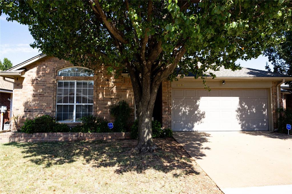 Welcome to 12612 Springwood Drive! This 3-bedroom, 2-bath home is tucked away on a cul-de-sac and backs to a small greenbelt. Inside, you’ll find tall ceilings, a gas fireplace, ceiling fans throughout, ample closet storage, new carpet, and new tile in the kitchen and bathrooms. Both bathrooms feature tiled tub surrounds rather than inserts, adding a clean, finished look. The primary suite includes a large walk-through style closet offering plenty of storage and convenience. Major updates include a new HVAC system, a new hot water tank in 2026, and a roof replaced in 2025. Outside, a large shade tree adds character to the front yard, while the fully fenced backyard offers plenty of shade and space to enjoy. With thoughtful updates, generous storage, and a peaceful setting, this home is ready for its next owner.