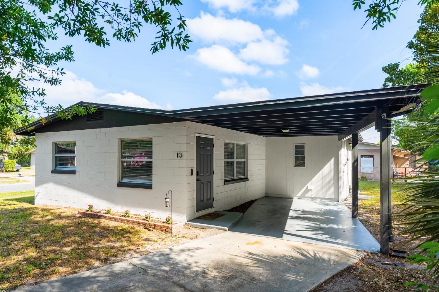 One or more photo(s) has been virtually staged. Welcome to this modern, beautifully updated 2 bedroom, 1 bath home ideally positioned on a 0.14 acre culdesac corner lot in the heart of Orlando, with potential for a 3rd bedroom.Step inside to find stylish gray luxury vinyl plank flooring throughout and a fully updated bathroom featuring elegant Corso Italia porcelain tile. The home has been thoughtfully improved with a shingle roof installed in June 2020, carport roof seal coated in July 2022, and complete electrical rewiring completed in 2022, offering peace of mind for years to come!The immaculate kitchen is designed for both function and style, featuring ample storage and LG appliances. Additional highlights include a security system and smart lock technology with keyless entry for added convenience.Enjoy a spacious backyard with endless potential, currently enclosed with wire fencing and offering a great opportunity to enhance privacy or create your own outdoor oasis, whether that means adding a pool or designing a custom landscape.Ideally located just minutes from Downtown Orlando, Millenia Mall, shopping, dining, and everyday conveniences, with very quick access to 408. Major attractions such as Universal Studios, outlet shopping, and MetroWest Golf Club are all within a short drive, making this property an excellent option for both homeowners and investors alike.Eligible buyers may qualify for up to $70,000 toward down payment and closing costs through available Orange County assistance programs. Program terms, conditions, and buyer eligibility apply.For a limited time, buyers who utilize preferred lending programs may receive an appraisal credit at closing for contracts secured on or before April 30, 2026! Contact listing agent for details!