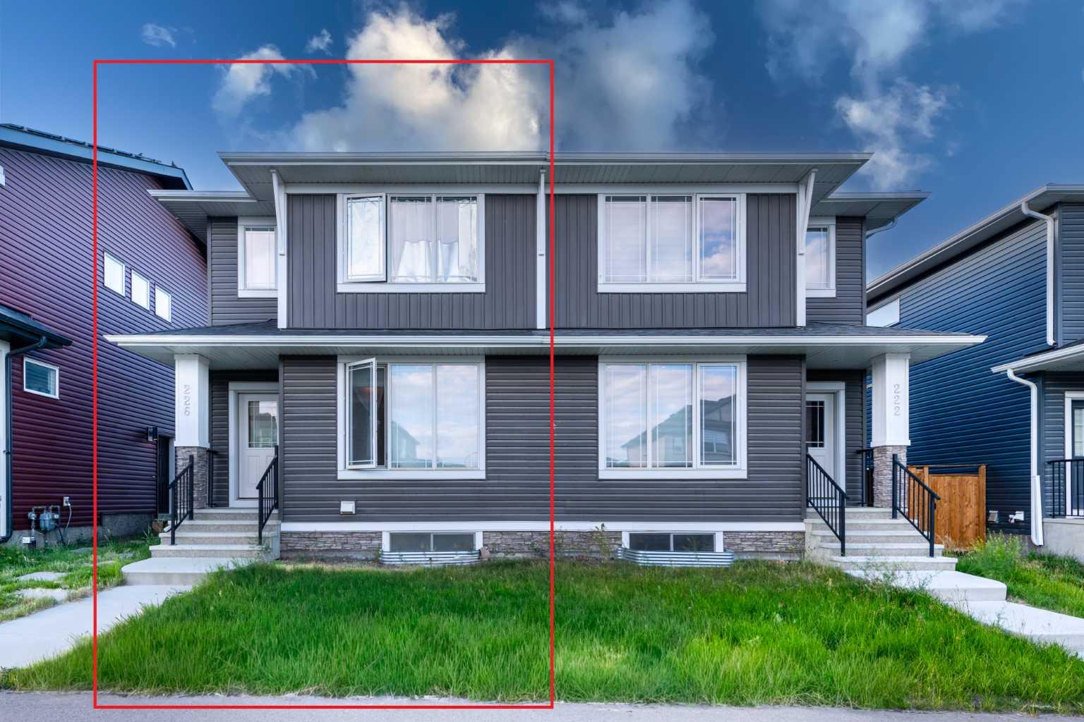 LEGAL 2 BEDROOM BASEMENT SUITE WITH SEPARATE ENTRANCE! Live up and rent down, or rent both units for double income. Welcome to this like new 2023 built half duplex in Moraine, one of NW Calgary's newest and fastest growing communities. With 1,766 sq ft above grade plus a fully finished legal suite below, you get 5 bedrooms, 3.5 bathrooms, and 2 full kitchens under one roof.The main floor is bright and open. The kitchen has a large island, a walk in pantry, and space for the whole family in the dining area plus a sunny breakfast nook. Step out to the deck with a BBQ gas line and enjoy your private back yard. Upstairs you will find a big primary bedroom with a walk in closet and its own ensuite, two more good sized bedrooms, a full bath, a family room, and upper floor laundry. No more carrying baskets up and down the stairs.The legal basement suite has its own separate entrance, 2 bedrooms, a full kitchen, a full bathroom, its own laundry, and storage. This is a true mortgage helper. Rent it out and let a tenant help pay your mortgage every month. Investors can rent both levels and collect two rents from one property.The location is a winner. A bus stop is just a short walk away. Grocery stores like FreshCo and No Frills are about 5 minutes by car. Restaurants, shops, parks, and playgrounds are all close by. Schools serving the area include Kenneth D. Taylor School, Captain Nichola Goddard School, and the brand new North Trail High School. Quick access to Stoney Trail makes getting anywhere in Calgary easy.Newer build means low maintenance and modern finishes like vinyl plank flooring throughout the main living areas. Perfect for first time buyers who want help with payments, growing families who need space, downsizers who want main floor living with income below, newcomers to Calgary, and investors looking for strong cash flow. Homes with legal suites in this price range do not last. Book your showing today!