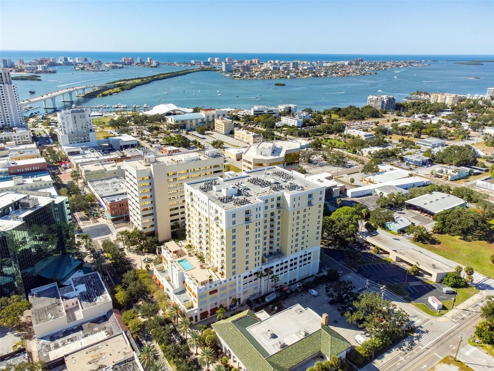You may have missed the ground-floor opportunity to invest in Downtown Clearwater—but this eighth-floor opportunity has only just begun.Welcome to this beautifully remodeled, approximately 1,460-square-foot, two-bedroom, two-bath residence in the heart of Downtown Clearwater, where space, easy beach access, coastal views, city lifestyle and extensive owner-quality improvements come together at a price point increasingly difficult to find in Tampa Bay's downtown markets. From the primary bedroom, living area and balcony, enjoy an expansive uninterrupted northerly coastal panorama stretching across Clearwater and toward the water. On the opposite side of the residence, the kitchen and second bedroom capture easterly views, bringing natural light into the home from multiple exposures that a corner unit brings. The remodel of the residence brings comfort, luxury, pride of ownership and enjoyment, and it shows.The kitchen has been transformed into a bright, contemporary space with extensive countertop and preparation areas, a large peninsula, stainless-steel appliances, abundant cabinetry and a clean coastal palette that opens beautifully into the living and dining areas.Both bathrooms were remodeled in 2025, with contemporary vanities, modern black fixtures, large-format tile, frameless glass shower enclosures and crisp finishes that give the home a sophisticated, current feel. Throughout the residence, you'll find luxury vinyl plank flooring, plantation shutters, generous storage and unusually spacious rooms. The second bedroom comfortably accommodates two beds while still providing room for a desk—and both bedrooms benefit from substantial closet space. The major updates continue behind the scenes: water heater February 2024, Bosch dishwasher 2023, GE French-door refrigerator 2021, water softener 2026, and both bathrooms remodeled in 2025. Three televisions, Thin Q Washer/Dryer 2021, water softener are also included. The building is 18 years old and recently underwent the 10 year plan paint and repair of the exterior surfaces including the balcony floors resurfacing.  The pool deck offers two bbq grills under the shaded pergolas that are on either side of the pool. The gym offers more than most HOA gyms and the club house offers an alternative for entailing at home if needed. Downtown Clearwater is undergoing significant redevelopment, and this residence puts you right in the middle of it. A site has already been cleared for the planned $50 million EVO Entertainment flagship destination, an approximately 83,000-square-foot entertainment complex announced for Cleveland Street and Myrtle Avenue. Plans call for seven cinema screens—including a 131-foot-wide screen—along with bowling, dining, arcade gaming, laser tag and additional entertainment. The Waterfront and  amphitheater are additional draw cards to the area.  All information is deemed correct,  Buyers and their agents to conduct due diligence on all listing information.