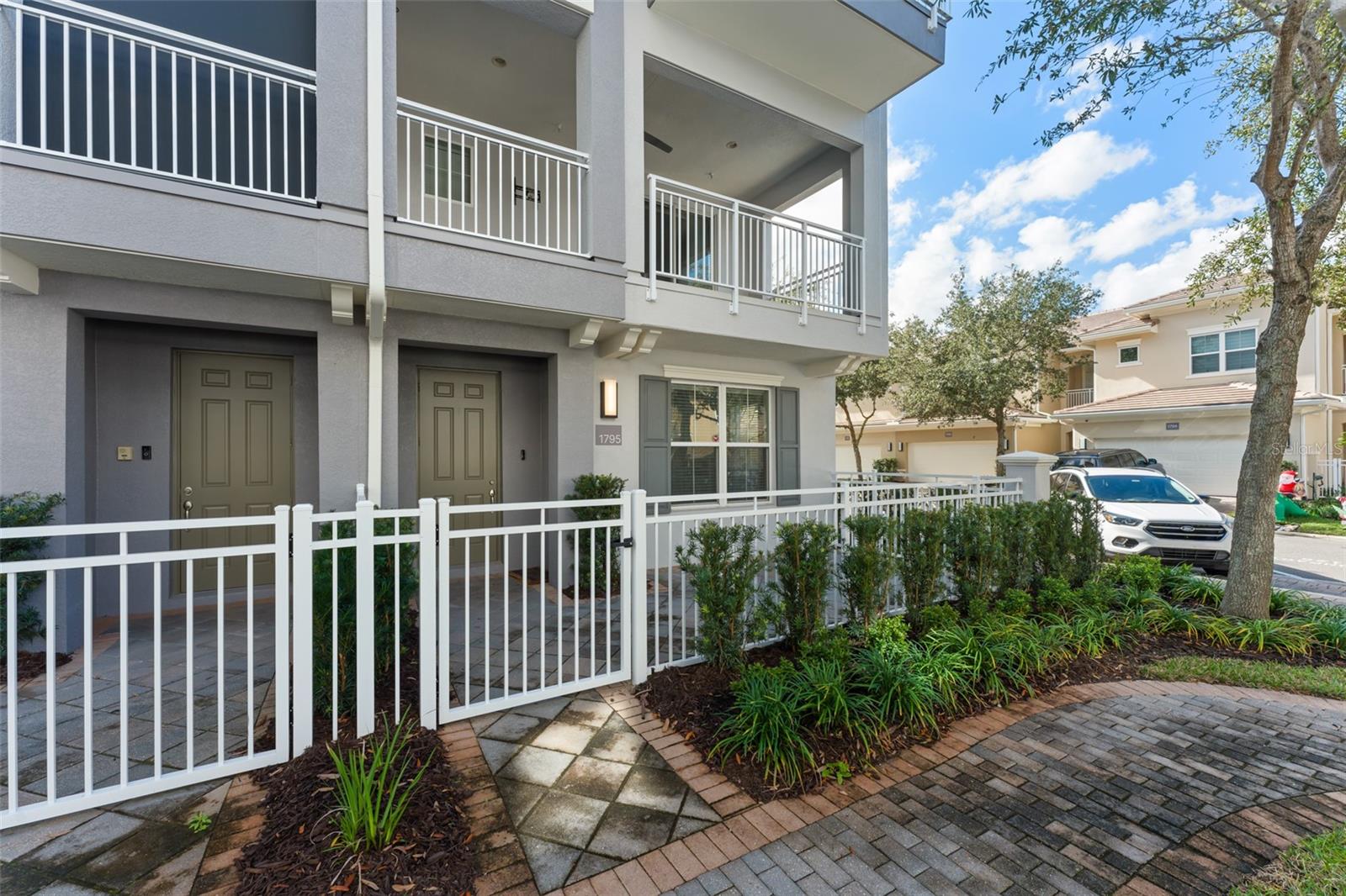 **This house comes with a REDUCED RATE through the seller's preferred lender. This is a lender-paid rate buydown that reduces the buyer's interest rate and monthly payment.**Ideally located in the heart of Lake Mary, 1795 Piedmont Place is a well maintained three-level townhouse in a gated community offering space, comfort, and convenience. With 2,187 square feet of heated living space, this home features a thoughtfully designed layout that provides flexibility and privacy across all three floors. Light-filled living areas create an inviting atmosphere, while the balcony offers the perfect spot to relax or enjoy your morning coffee. The multi-level design allows for distinct living, working, and entertaining spaces, making it ideal for today’s lifestyle.Residents enjoy access to exceptional community amenities, including a clubhouse, fitness center, community pool, playground, and dog park. The gated setting enhances privacy and peace of mind, while the well-maintained surroundings contribute to the community’s overall appeal. Conveniently located near top-rated schools, shopping, dining, parks, and major commuter routes, this townhouse delivers a low-maintenance lifestyle in one of Lake Mary’s most desirable areas.