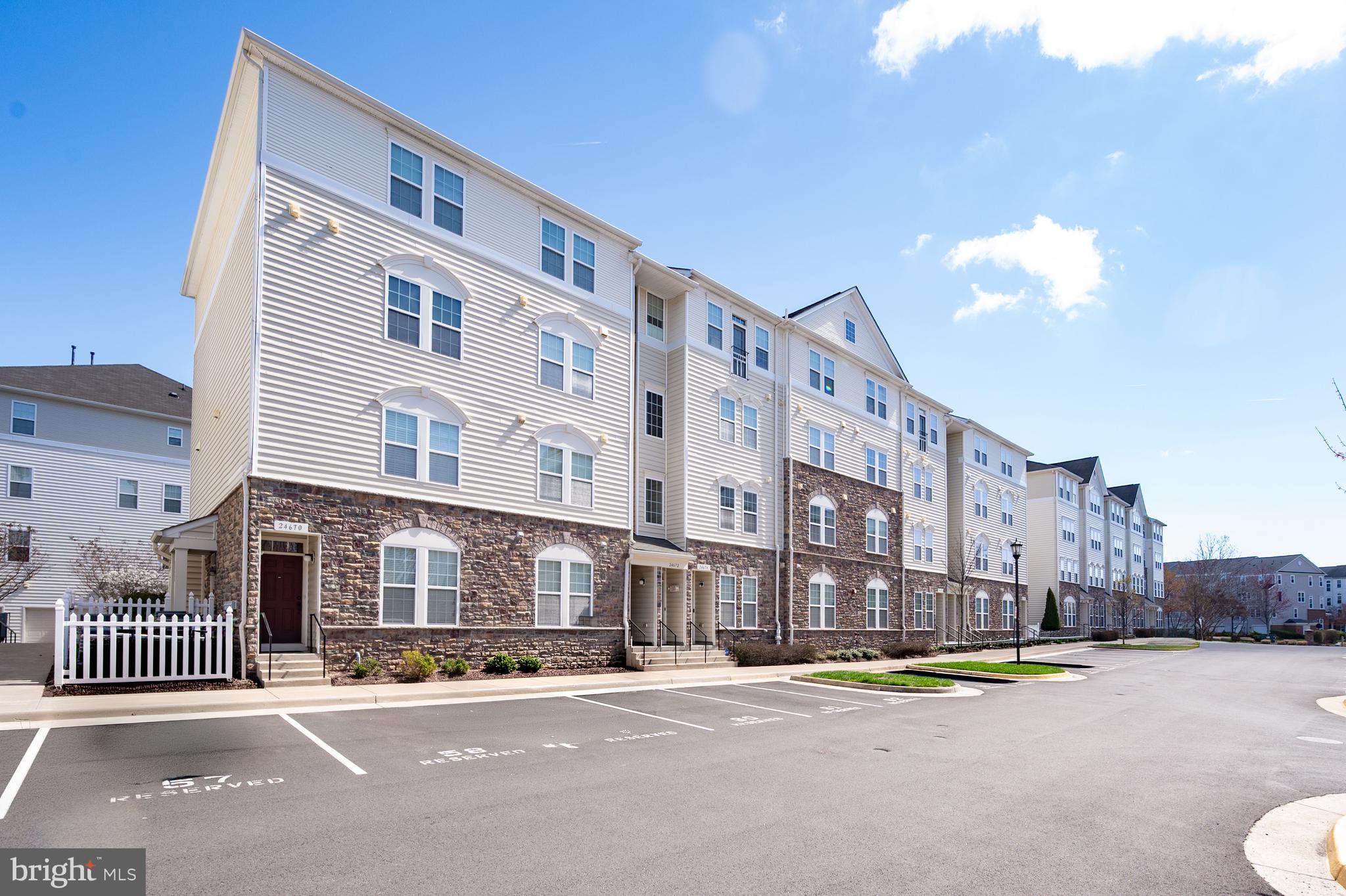 LIGHT AND BRIGHT!  3  BEDROOM CONDO IN SOUGHT AFTER STONE RIDGE!!  LOVINGLY MAINTAINED.  Enter on ground level and walk up one set of stairs to your SPACIOUS ONE LEVEL LIVING!The  large family room, dining area and kitchen are open and airy.  Stainless appliances, backspace and granite counter tops.  There's great deck off the family room. Three bedrooms, which are rarely available in this price range, offer extra flexibility and ease.  GARAGE .Stone Ridge offers many amenities.  Several pools, fitness center, walk to the large county library, shopping and restaurants.