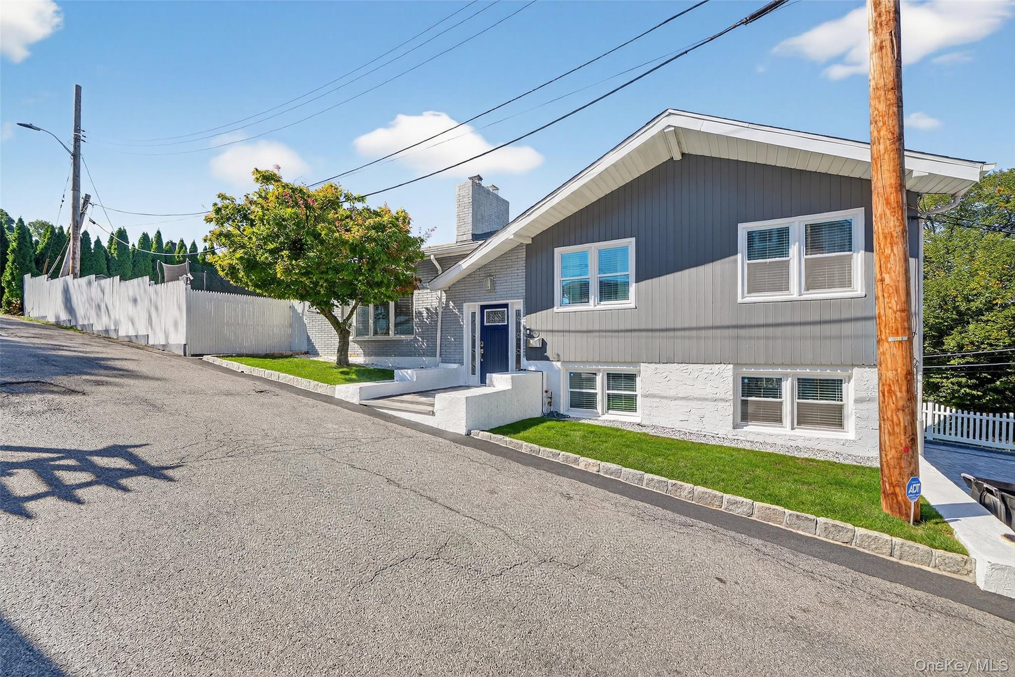 Step into this beautifully renovated 3-bedroom, 2-bath home offering modern updates and comfortable living in a prime Yonkers location. Every detail has been refreshed from top to bottom, creating a move-in ready space with warm natural light and stylish finishes throughout. The spacious lower level provides a versatile layout perfect for entertaining, a family room, or even in-law use, adding exceptional flexibility for today’s lifestyle. Outside, you’ll find a welcoming yard and neighborhood setting, just moments from shopping, schools, parks, and convenient commuting options into New York City. This home is a perfect blend of value, functionality, and modern living—ready to enjoy from day one.

Inside, the updated kitchen shines with quartz countertops, custom cabinetry, and a classic white beveled-edge subway tile backsplash, seamlessly combining function and style. The kitchen opens to a formal dining space and sliders to a covered outdoor dining space, both perfect for entertaining large crowds.  A stunning stone fireplace with a modern insert anchors the living space, while fully renovated baths in sleek neutral grays provide a fresh, spa-like feel. Lower level offers multiple zones- mudroom, laundry, full bath, home gym and two recreation rooms perfect for guests, in law use or work from home especially with separate entrance both at the rear and off the expansive paver stone driveway.  Outdoors, multiple patio levels—including a covered area, herringbone Trex decking area surrounding above ground pool with views of all of Yonkers—offer a variety of entertaining zones for summer barbecues, quiet relaxation, or gatherings with family and friends, making this home truly exceptional inside and out. PLEASE PROVIDE H&B BY 10/1 AT 7PM