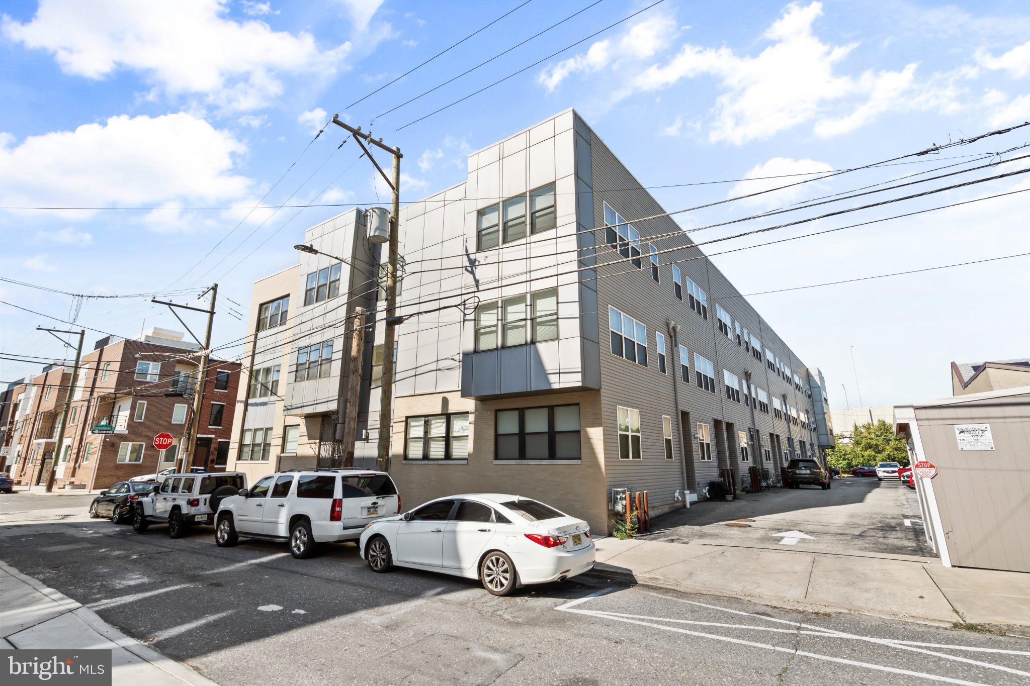 PARKING!! Welcome to this stunning 1,500 sq. ft. bi-level 2 bedroom 2 full bathroom residence in the heart of desirable Fishtown! Situated in a secure-access building, this exceptional home seamlessly combines modern luxury, spacious living, and unmatched outdoor space. The main level features a beautiful custom kitchen that opens into an expansive family room, creating an ideal layout for both everyday living and hosting. Step upstairs to your private roof deck boasting breathtaking, 360-degree views of the Philadelphia city skyline and nearby waterfront. Complete with one deeded parking space for ultimate urban convenience. Located just steps from Fishtown's premier dining, shopping, and entertainment, with effortless access to public transit, Center City, and I-95 North and South. Schedule your showing today!
