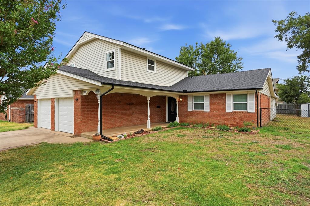 Welcome to this spacious 4 bedroom, 2 bathroom home in the Woodslawn neighborhood! This two story home offers a traditional floor plan with defined spaces and plenty of room to spread out. The oversized living room is anchored by a cozy brick fireplace with built-ins and flows into the dining room and kitchen, which offers plenty of counter and cabinet space. A huge second living room addition provides even more space for entertaining, relaxing, or creating a flexible space to fit your needs. The primary bedroom is conveniently located on the first floor, offering easy access and separation from the upstairs bedrooms.All four bedrooms are comfortably sized, offering plenty of room throughout the home. Out back, you’ll find a spacious backyard and large covered patio perfect for enjoying the outdoors. Newer windows, appliances, and roof  installed. Conveniently located just minutes from Cleveland Elementary School, Westwood Golf Course and Water Park, and the University North Park shopping district with plenty of nearby shopping, dining, and entertainment.