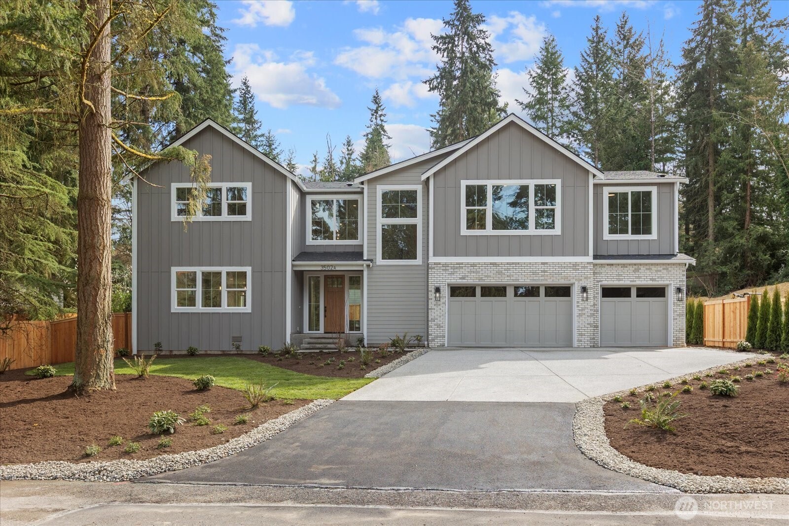 Exceptional opportunity offering a spacious main residence plus a private DADU with future investment flexibility. The 3,302 sqft main home features 5 bedrooms and 3.5 baths with a bright open-concept layout, perfect for everyday living and entertaining. A main-floor bedroom with a 3/4 ensuite provides an ideal space for guests, multigenerational living, or private home office. Upstairs, a spacious primary suite with a 5 piece ensuite, complete with dual walk-in closets. Three additional bedrooms, full bath and large open bonus room on the 2nd level offer ample space for play, work or relaxation. Step outside to enjoy outdoor living with a covered patio, propane BBQ stub and fully fenced private backyard. An extension of your living space and ideal for year-round gatherings.  The detached 1,000 sqft ADU sits on its own fully fenced lot, offering 3 bedrooms, 2.5  baths, and a 1 car ((205 sq feet) garage. Every square foot was thoughtfully designed to maximize functionality. The layout creates a seamless flow between living, dining, and kitchen spaces, making the home feel both spacious and practical. The DADU primary upstairs also includes its own private ensuite ideal for comfortable living or rental use. All utilities are independently metered, providing true autonomy and convenience. Rare investment opportunity with potential for the DADU to be sold separately in the future. (has it's own tax parcel)
