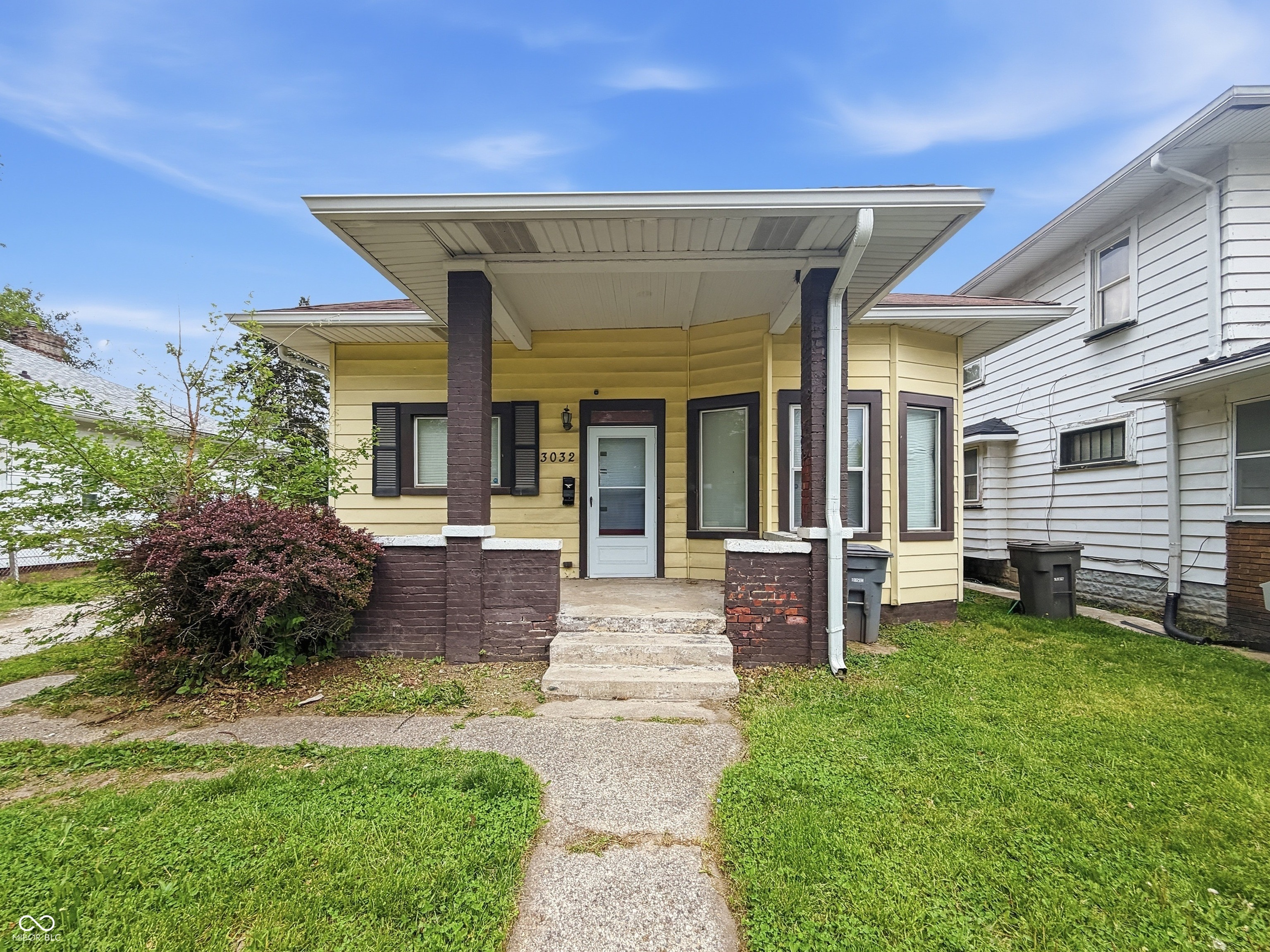 This classic bungalow is full of charm and ready for someone to make it their own. From the moment you arrive, you'll appreciate the character and cozy feel that only a home of this era can offer. Whether you're looking for a place to settle in or an opportunity to add your personal touch, this one is worth a closer look.  Built in 1901, this single-level home offers 1,092 square feet of living space and features aluminum siding with a mix of wood and vinyl windows. Inside, you'll find 2 bedrooms and 1 bath, with a layout that feels both comfortable and functional. With no garage, the property keeps things simple while offering plenty of potential to create a space that truly feels like home.