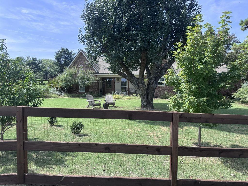 Experience comfortable country living right in the heart of Copper Canyon. This 3-Bedroom, 4-Bathroom retreat sits on a private, lush, large 1.14-acre lot. Zoned for Lewisville Flower Mound district schools. 1 bedroom can easily be converted to a study or office. Tall beautiful pines border the drive with other mature trees throughout the property. Your own private slice of heaven! This incredible property seamlessly blends peaceful, secluded country vibes with the convenience to modern shopping and entertainment in Highland Village and Flower Mound. Recent investments to this estate include:• Elevated Appeal: refreshed fascia, soffit, recent rustic wood shutters, elegant wood columns on the porch, a stunning wood glass farm front door with sidelight windows, an electric drive gate, and walk gates. And a pristine cowboy pool nestled in the backyard.• Livestock Ready: recent ranch-rail wood fencing, a livestock run-in shed and a chicken coop for ultimate convenience• Ultimate Backyard Entertaining: A large, dedicated fire pit area large enough to gather and relax under the wide-open night sky by the fire.This gem also boasts an updated kitchen with natural stone countertops, abundant natural light and a sprawling backyard that feels worlds away from the city.