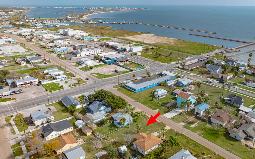 Offering an exceptional location from this South Rockport homesite just half a block to Rockport's vibrant downtown restaurants, galleries, shopping, nightlife, as well as a short stroll to Rockport Beach, Marina, fishing jetties/pier. This location has even more to offer just 2 blocks from Water Street, a fabulous walkable Bayfront street with abundance of water fowl, sunrises and sunsets to experience.  Here's your opportunity to build your coastal getaway on this amazing property.  Don't let it get a way!