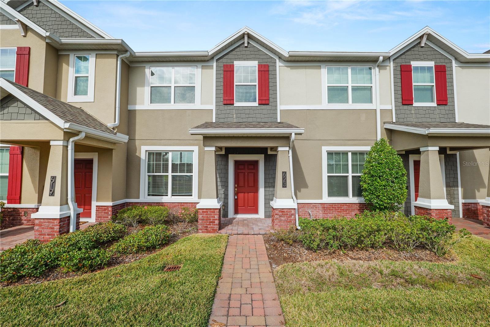 Welcome to this beautifully maintained 3-bedroom, 2.5-bath townhome in the Heritage at Plant Street community, where thoughtful design meets everyday convenience. From the moment you step inside, the layout feels intuitive and welcoming, ideal for both daily living and entertaining.The main level features a spacious kitchen with granite countertops, generous upper cabinetry, and a gas range, creating a functional and inviting space to cook and gather. A convenient half bath for guests and a well-placed drop zone just off the two-car garage make daily routines effortless. The living area flows seamlessly to a private, pavered patio with a screened enclosure and gas grill hookup, perfect for relaxed evenings or weekend get-togethers.Upstairs, new carpet adds a fresh feel throughout the well-sized bedrooms. The primary suite includes double sinks in the en-suite bath, while additional storage is thoughtfully located beneath the staircase. Double-pane windows enhance comfort and efficiency, and both the home and community are equipped with fire safety systems for added peace of mind. A gas water heater completes the home’s efficient design.Residents enjoy a low-maintenance lifestyle with HOA amenities that include a community pool, dog park, sidewalks, and a community mailbox. Golf carts are permitted, adding to the neighborhood’s relaxed and connected feel. The HOA also provides exterior maintenance, grounds maintenance, and maintenance repairs in the community.Located just steps from the Orange Park Trail, this home offers an easy walk or bike ride into downtown Winter Garden, where shopping, dining, and local favorites await. This move-in-ready townhome delivers comfort, functionality, and an exceptional location for those seeking convenient, low-maintenance living.