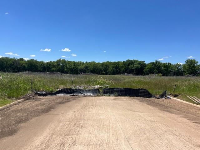 31+ acres behind (south) the Lake Country Crossing subdivision.  Property is located in Pottsboro City Limits and is included in a Tax Increment Reinvestment Zone.  Great property to develop as it is contiguous with one of the nicest developments in Pottsboro!  Or, a perfect place to build a home in the City Limits of Pottsboro while still maintaining acreage.  City water is stubbed to the end of Loving Trail and ready for hook up.