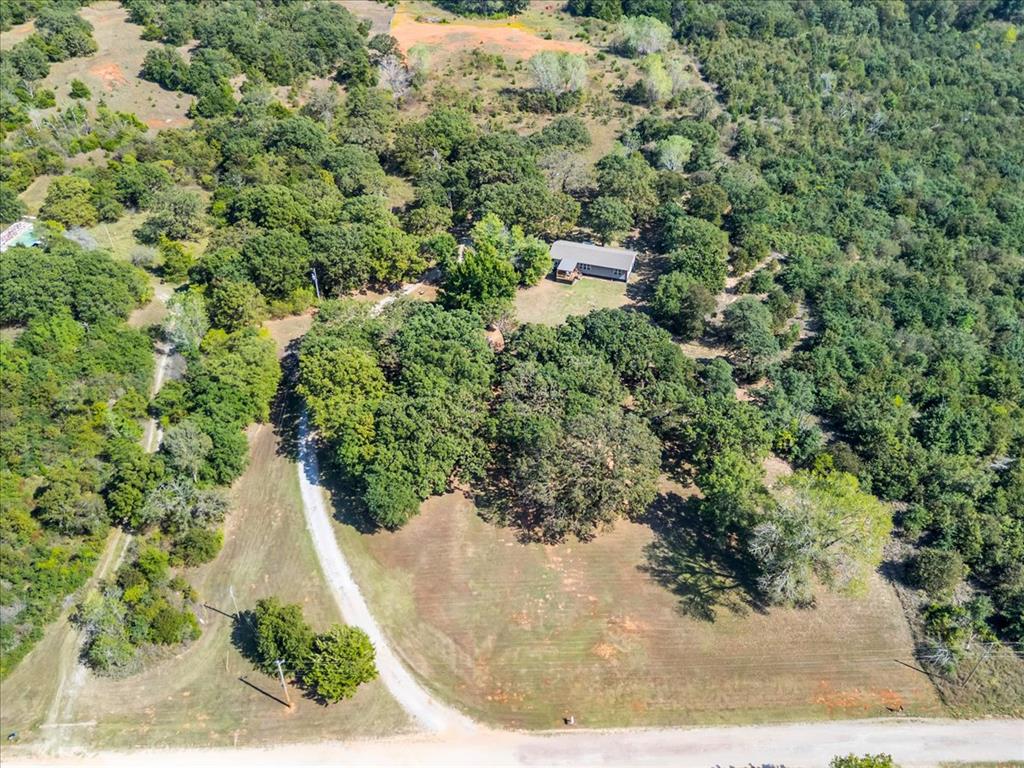 Built in 2020 and nestled on over 10 beautiful wooded acres, this three-bedroom, two-bathroom home blends modern comfort with privacy and natural surroundings. The property has been exceptionally well maintained inside and out, offering a rare opportunity to enjoy both convenience and seclusion just minutes from Norman.
Inside, you’ll find an open floor plan filled with natural light, a spacious kitchen with ample storage, and a welcoming living area designed for both everyday living and entertaining. The primary suite provides a peaceful retreat with generous closet space and a well-appointed bath.
Step outside and enjoy your own private acreage with mature trees, trails, and plenty of room for outdoor living, recreation, farm animals, or future expansion. Whether you envision gardening, hobby farming, or simply relaxing on the porch while taking in the scenery, this property provides endless possibilities.
Don’t miss this rare opportunity to own an acreage so close to town!