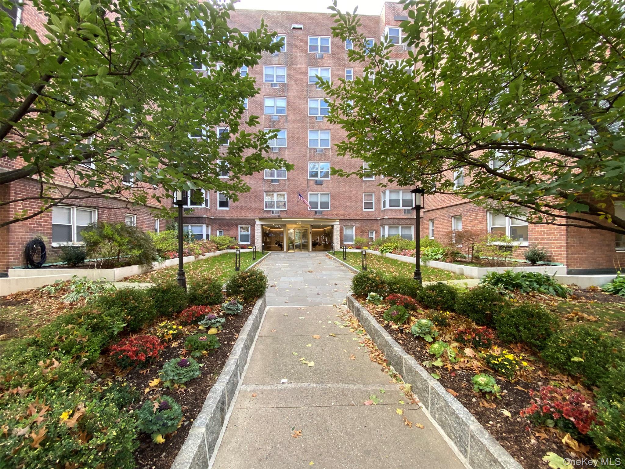 Move right into this beautifully updated one-bedroom apartment featuring a renovated kitchen and bath, freshly painted interiors, and gorgeous new hardwood floors throughout. This bright and inviting home also includes a versatile bonus room with two double closets — ideal for a home office, guest room, or additional storage. AND a valet parking space in the garage underneath. Pets accepted. Perfectly located, just a five-minute walk to town, offering convenient access to shops, dining, and transportation. Electric car ports are available in the garage.